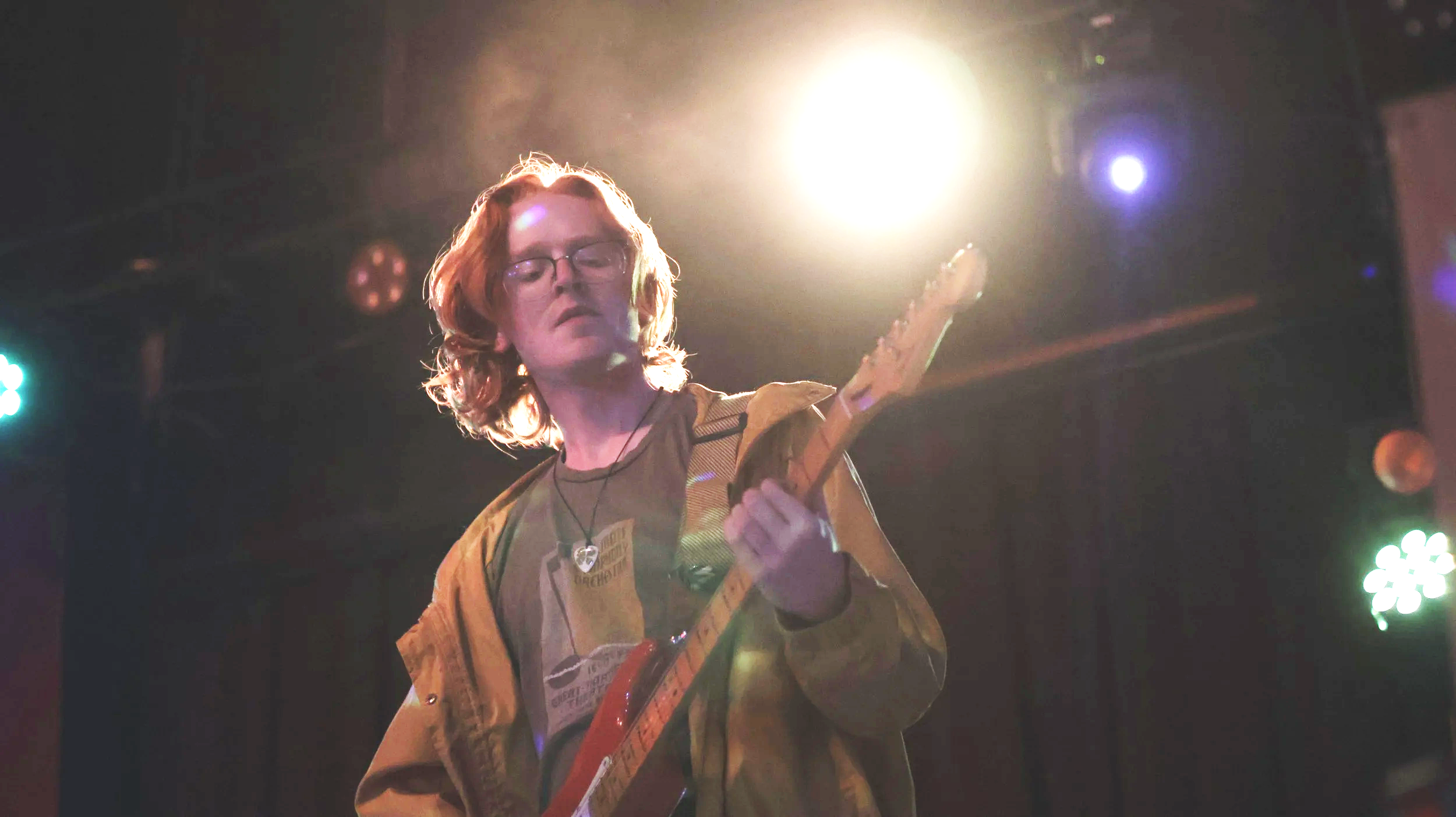 Brendan Coller playing guitar in the band Ecotone