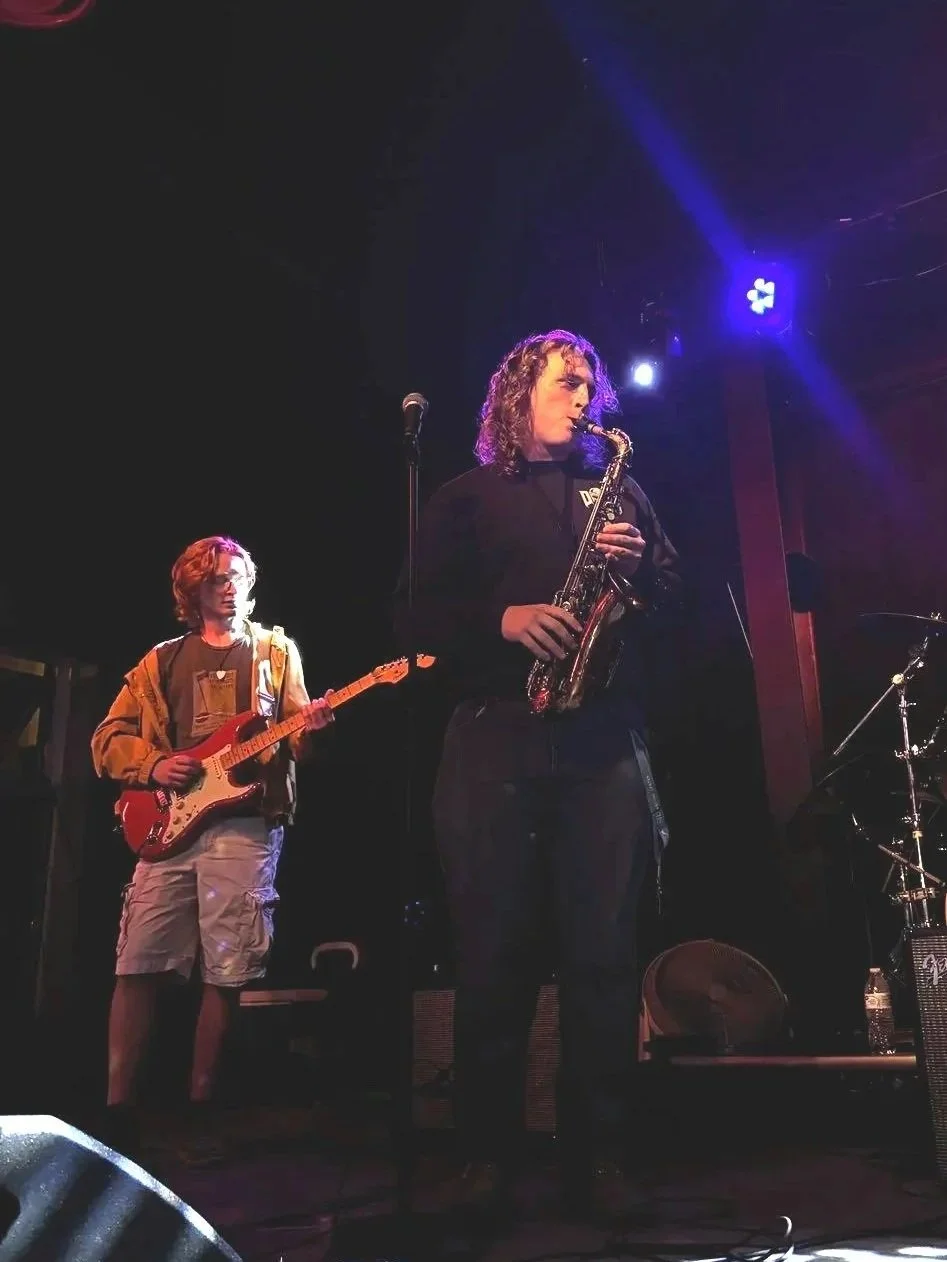 Brendan and Sam playing music together in the band Ecotone