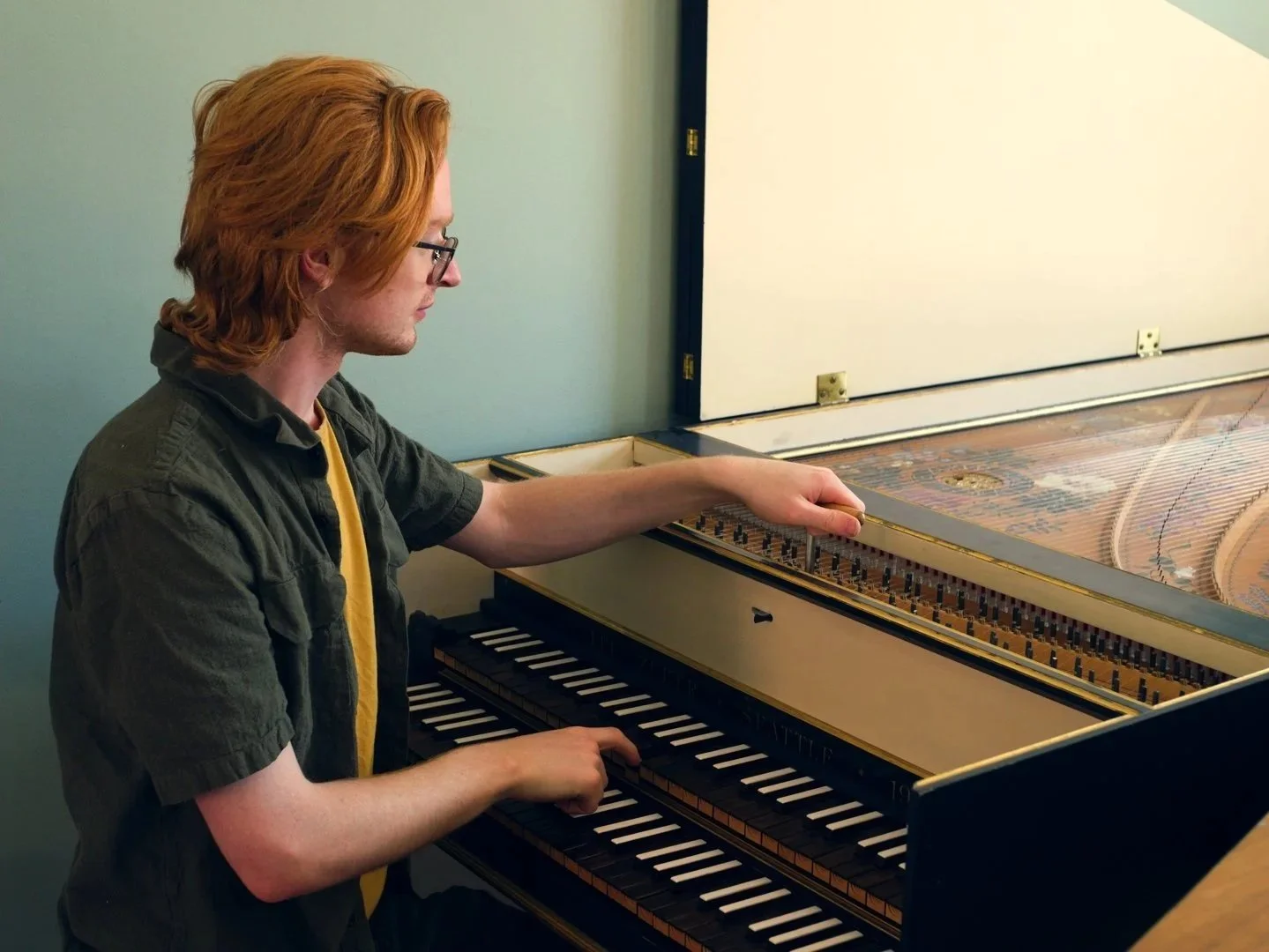 Brendan Coller tuning a harpsichord