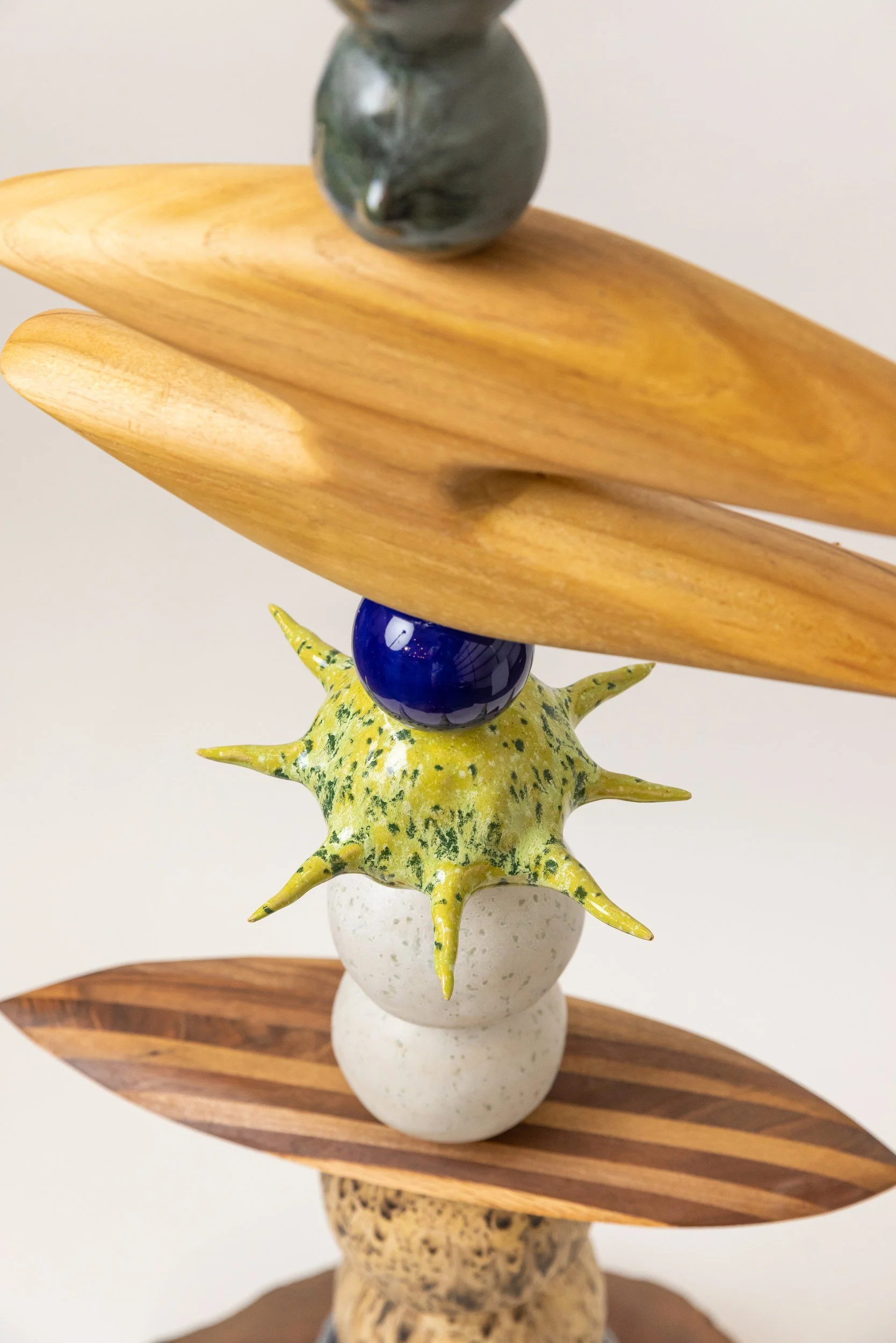 Totem No. 14 (TM014) — detail view 1   ·   Description: Totem No. 14 (TM014), one-of-a-kind ceramic and hand-carved wood totem sculpture by Brendan Bishop, Grip Fast Studio, Omaha — detail view 1.