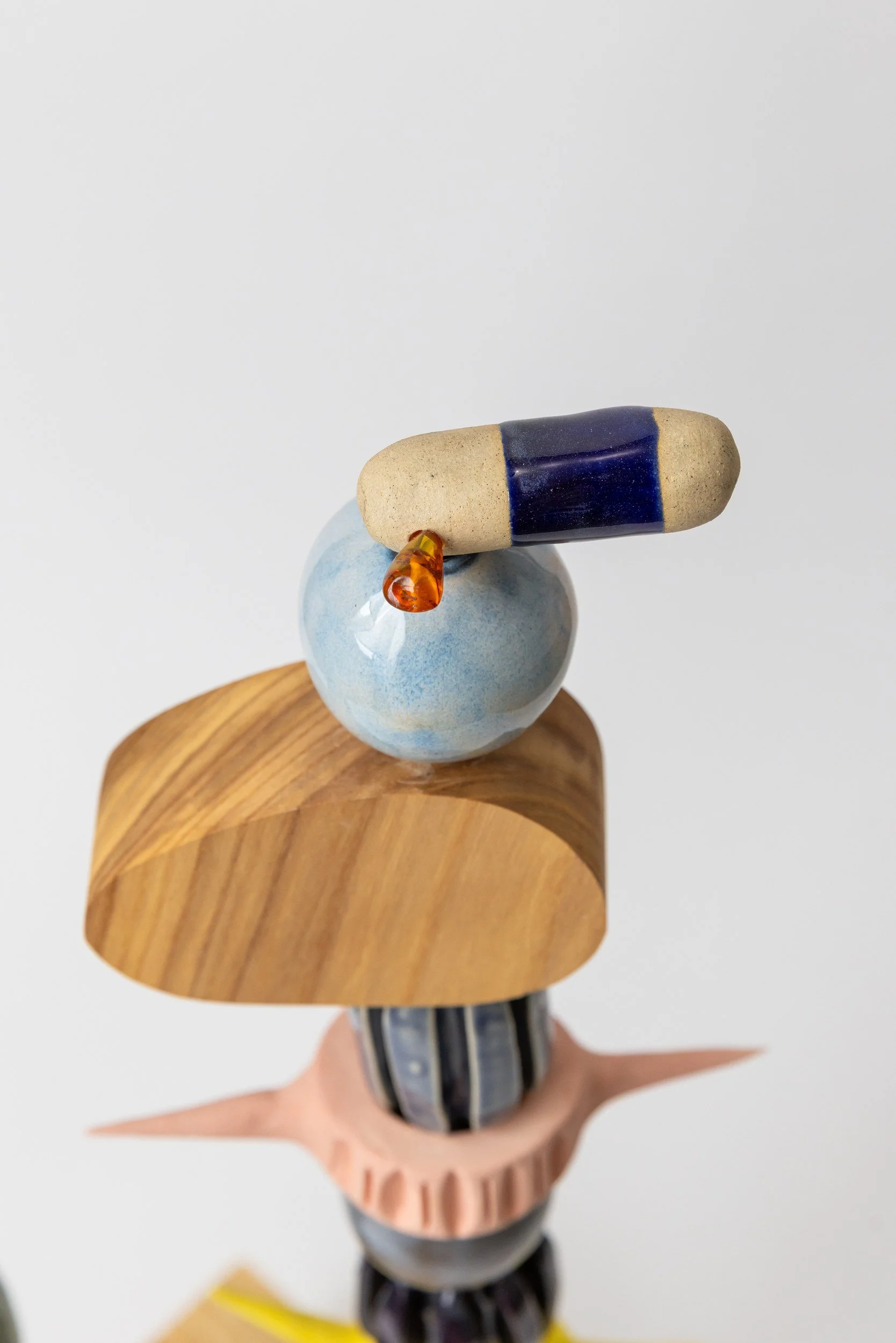 Totem No. 5 (TM005) — detail view 6   ·   Description: Totem No. 5 (TM005), one-of-a-kind ceramic and hand-carved wood totem sculpture by Brendan Bishop, Grip Fast Studio, Omaha — detail view 6.