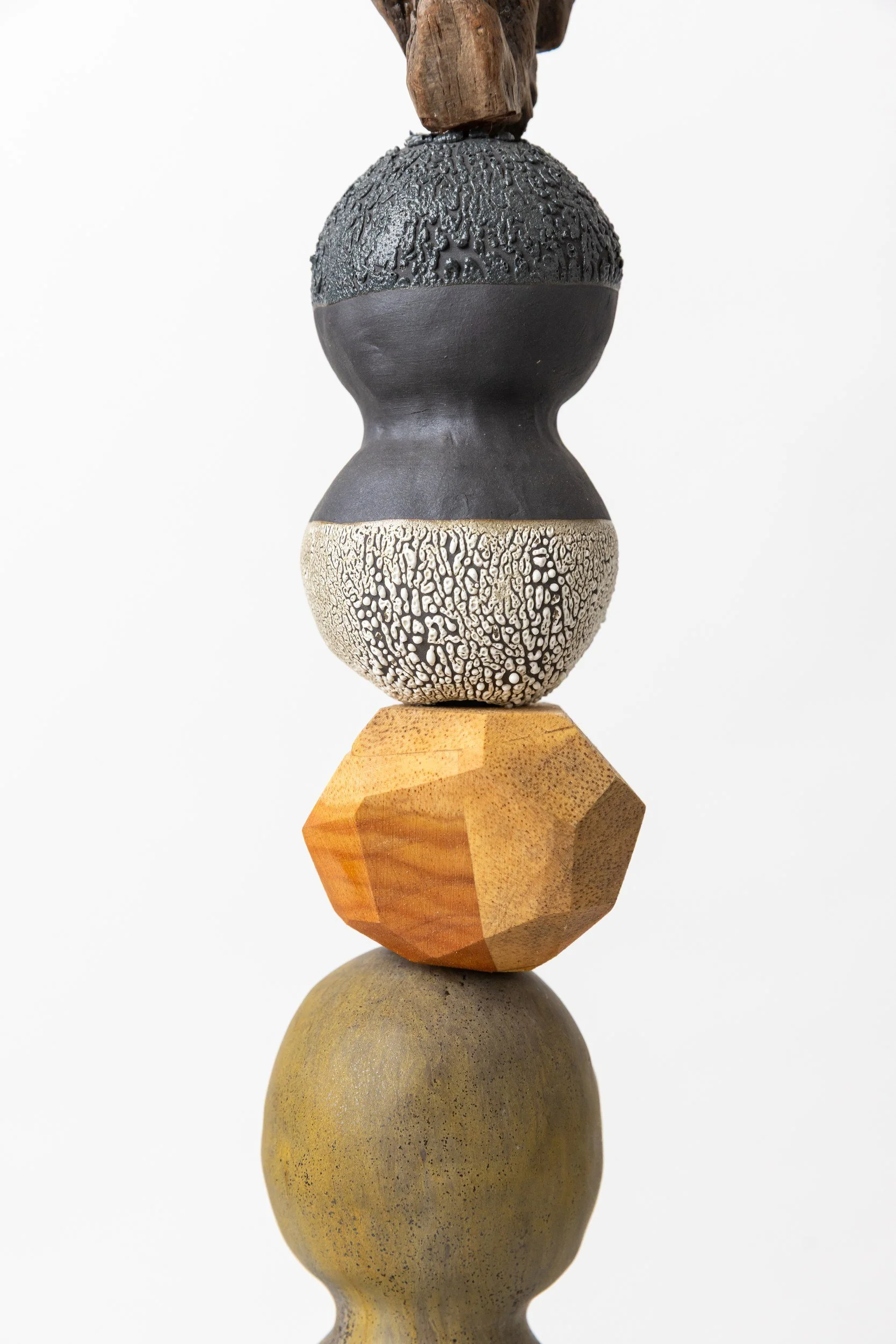 Totem No. 4 (TM004) — upper detail — driftwood crest, crawl-glaze orb, faceted wood