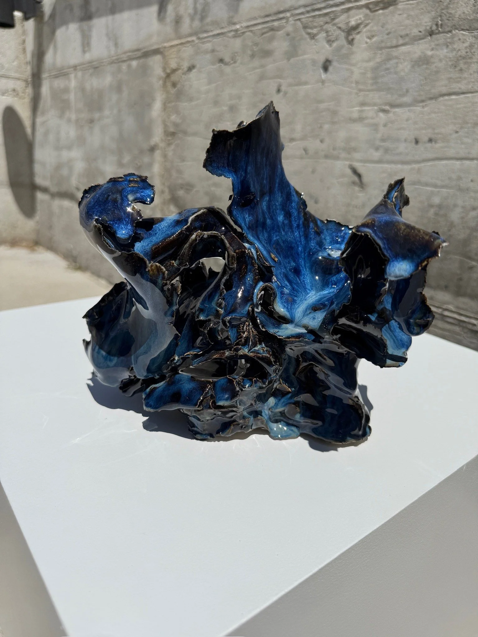 Title: Wave No. 2 (IM010) — detail view 1   ·   Description: Wave No. 2 (IM010), one-of-a-kind ceramic impact study sculpture by Brendan Bishop, Grip Fast Studio, Omaha — detail view 1.