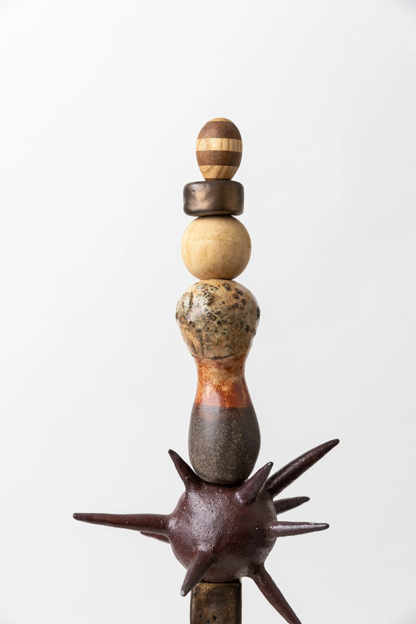 Totem No. 11 (TM011) — detail view 1   ·   Description: Totem No. 11 (TM011), one-of-a-kind ceramic and hand-carved wood totem sculpture by Brendan Bishop, Grip Fast Studio, Omaha — detail view 1.