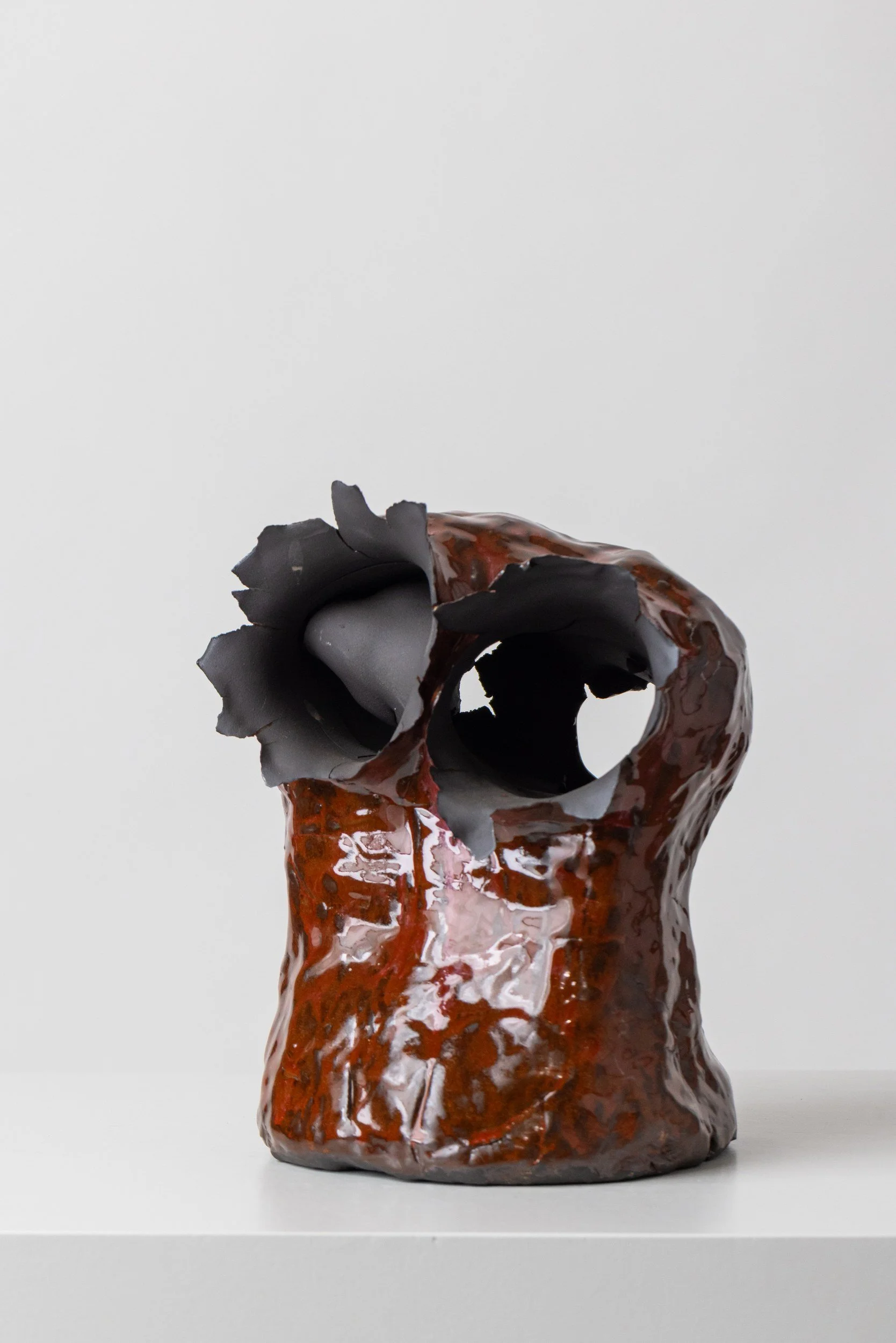 Licks (IM004) — detail view 1   ·   Description: Licks (IM004), one-of-a-kind ceramic impact study sculpture by Brendan Bishop, Grip Fast Studio, Omaha — detail view 1.