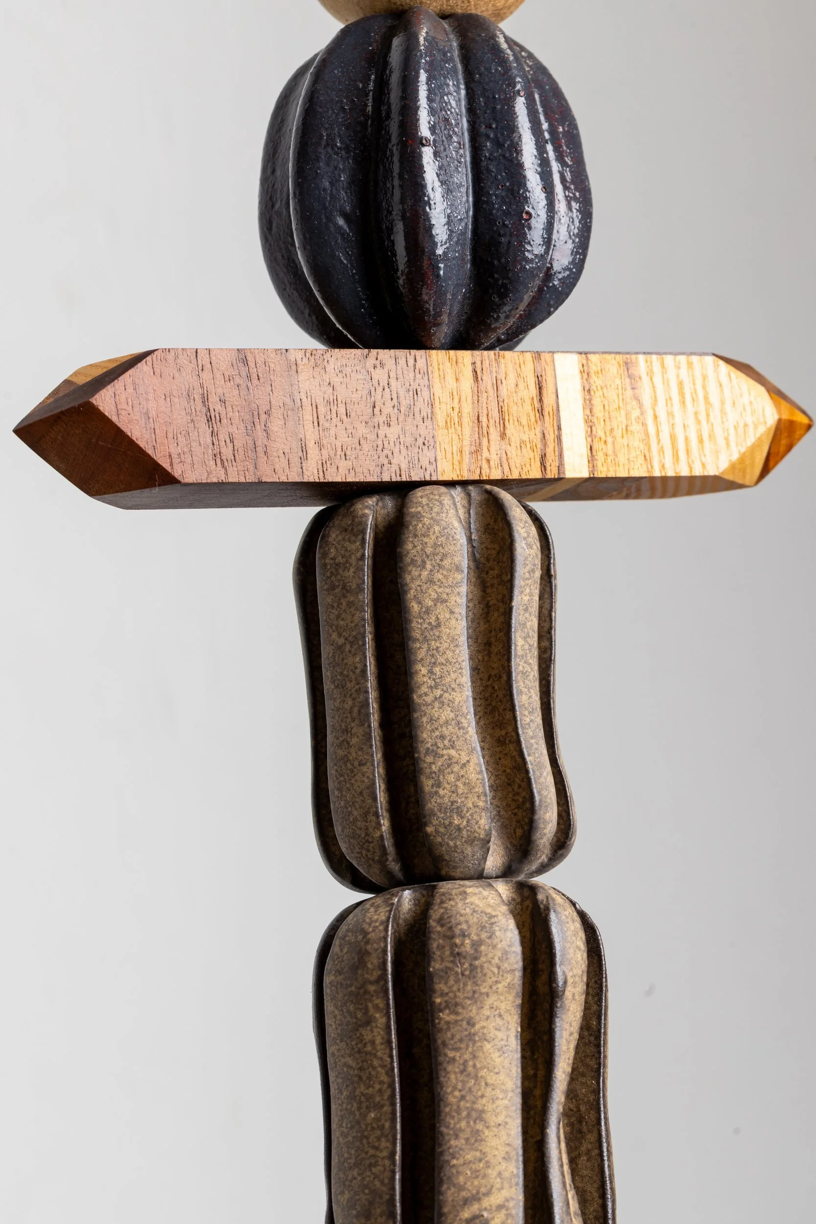 Totem No. 3 (TM003) — detail view 1   ·   Description: Totem No. 3 (TM003), one-of-a-kind ceramic and hand-carved wood totem sculpture by Brendan Bishop, Grip Fast Studio, Omaha — detail view 1.