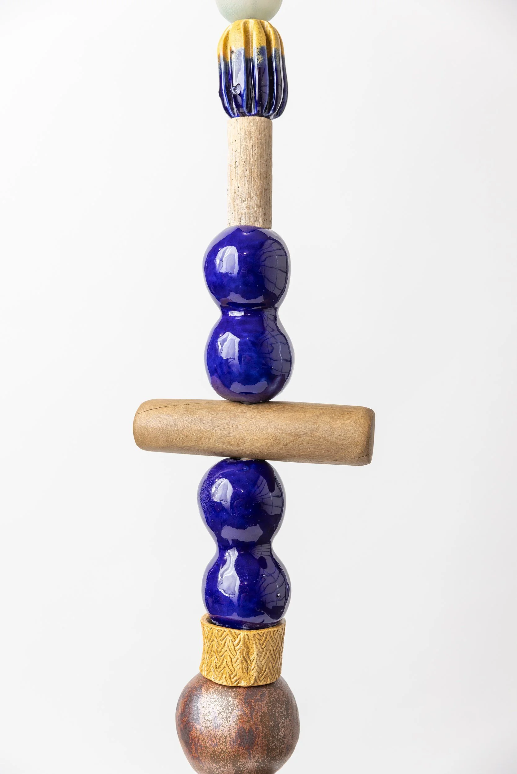 Totem No. 2 (TM002) — detail view 3   ·   Description: Totem No. 2 (TM002), one-of-a-kind ceramic and hand-carved wood totem sculpture by Brendan Bishop, Grip Fast Studio, Omaha — detail view 3.