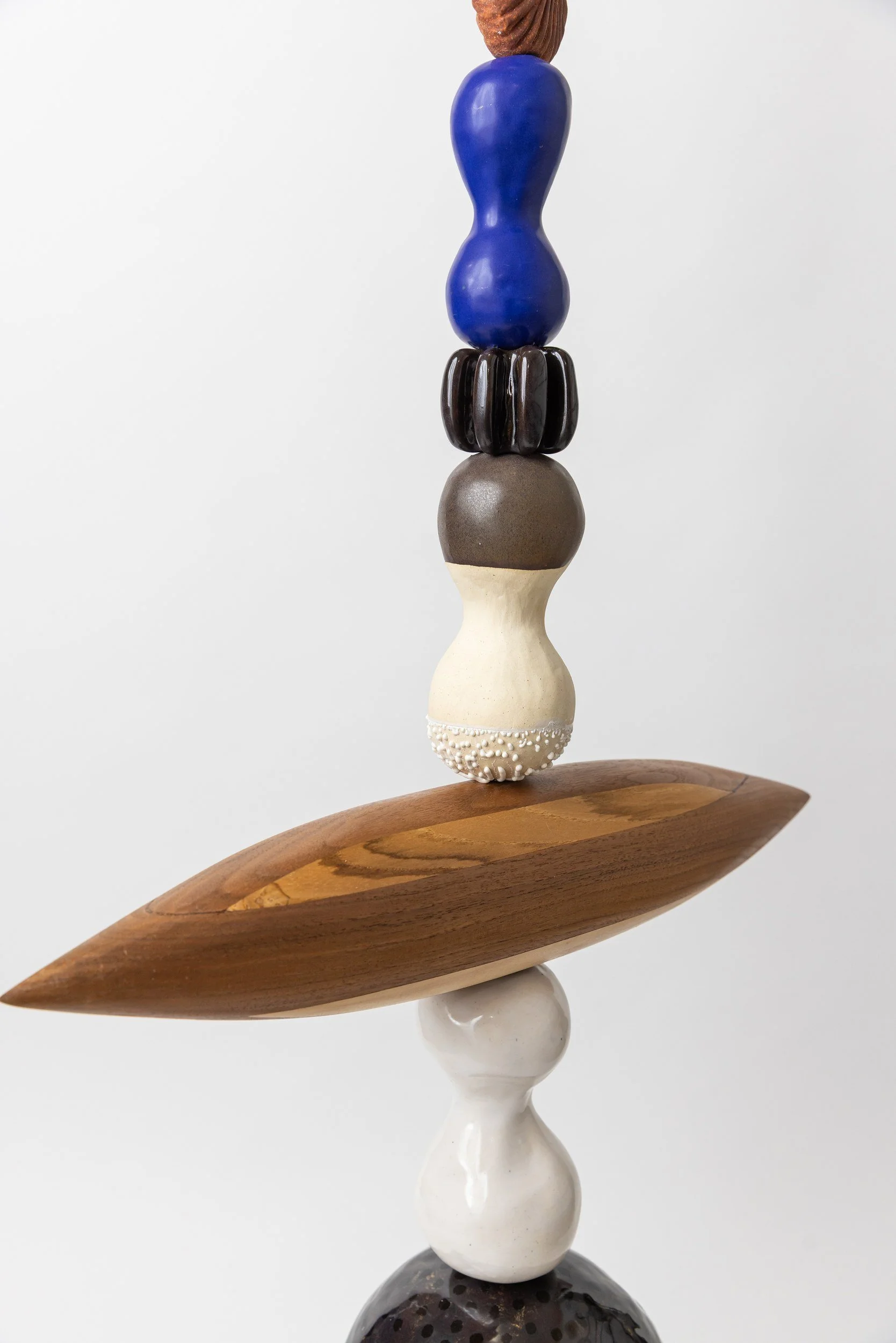 Totem No. 6 (TM006) — detail view 2   ·   Description: Totem No. 6 (TM006), one-of-a-kind ceramic and hand-carved wood totem sculpture by Brendan Bishop, Grip Fast Studio, Omaha — detail view 2.