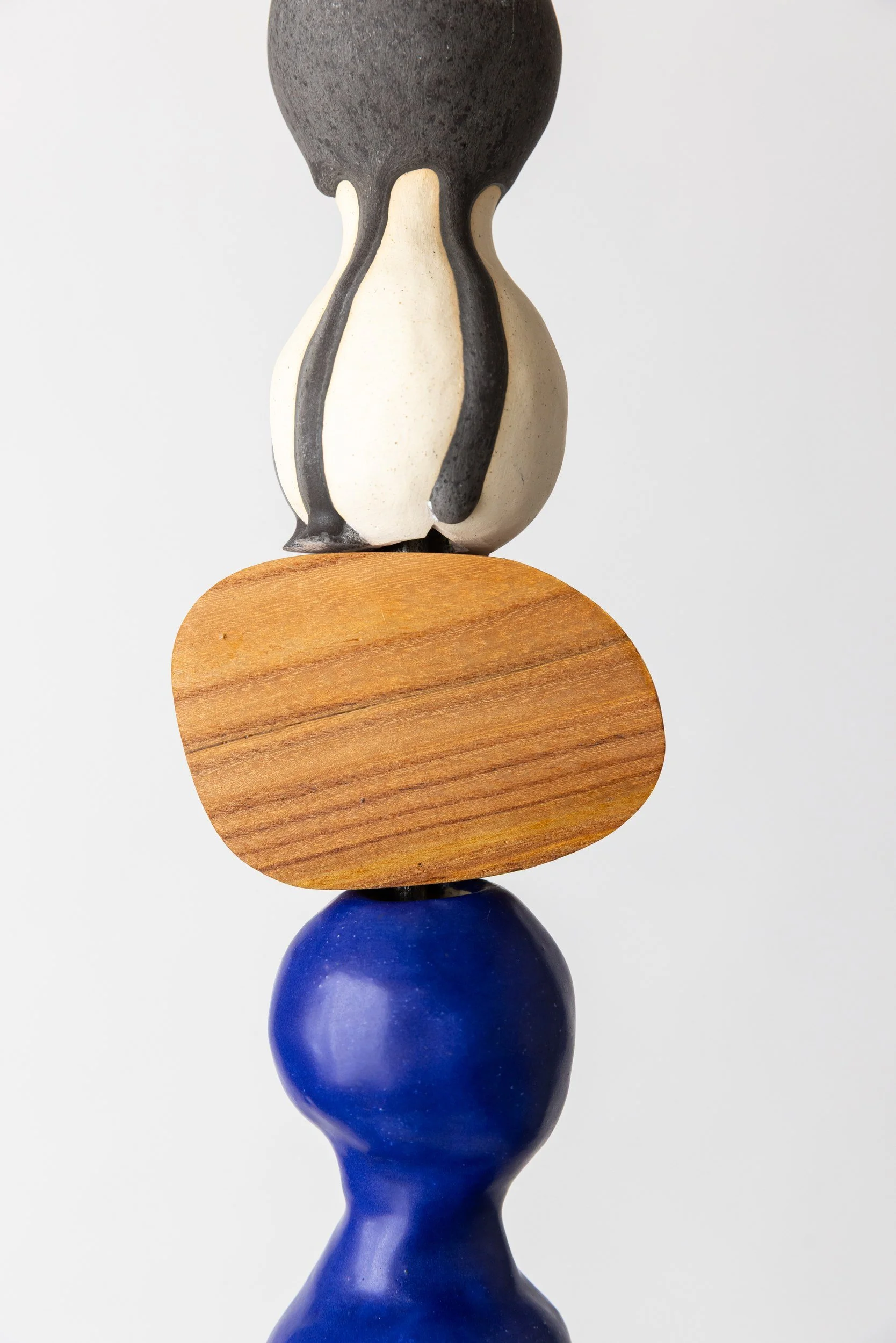 Totem No. 7 (TM007) — detail view 1   ·   Description: Totem No. 7 (TM007), one-of-a-kind ceramic and hand-carved wood totem sculpture by Brendan Bishop, Grip Fast Studio, Omaha — detail view 1.