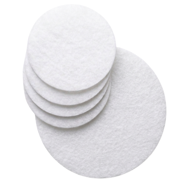 Six white cotton pads stacked with one laid flat in front.