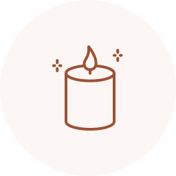 Line drawing of a lit candle with sparkles around it