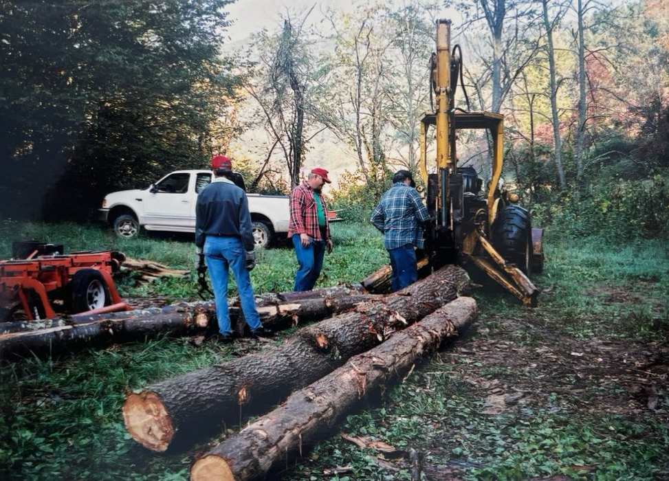 ~2000 - Lumber felled on local land by the Spring Creek community. Trees and labor were donated to restore the Spring Creek School.