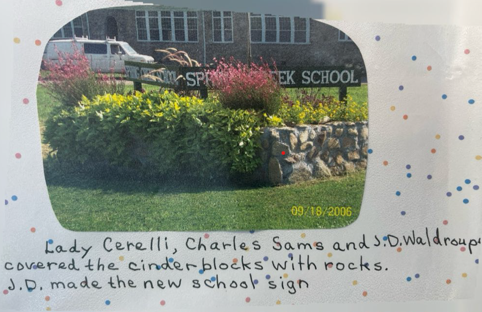 The School Sign circa 2006 after the planter was covered with the rocks classic to the area's buildings.