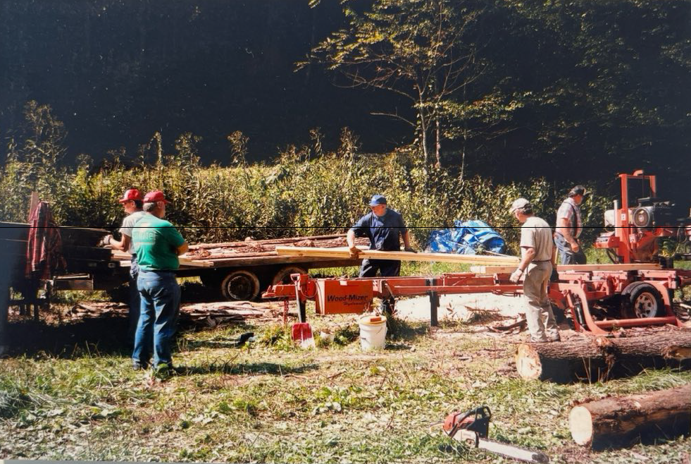 ~2000 - Lumber being planed by the Spring Creek community to use in the restoration of the Spring Creek School.