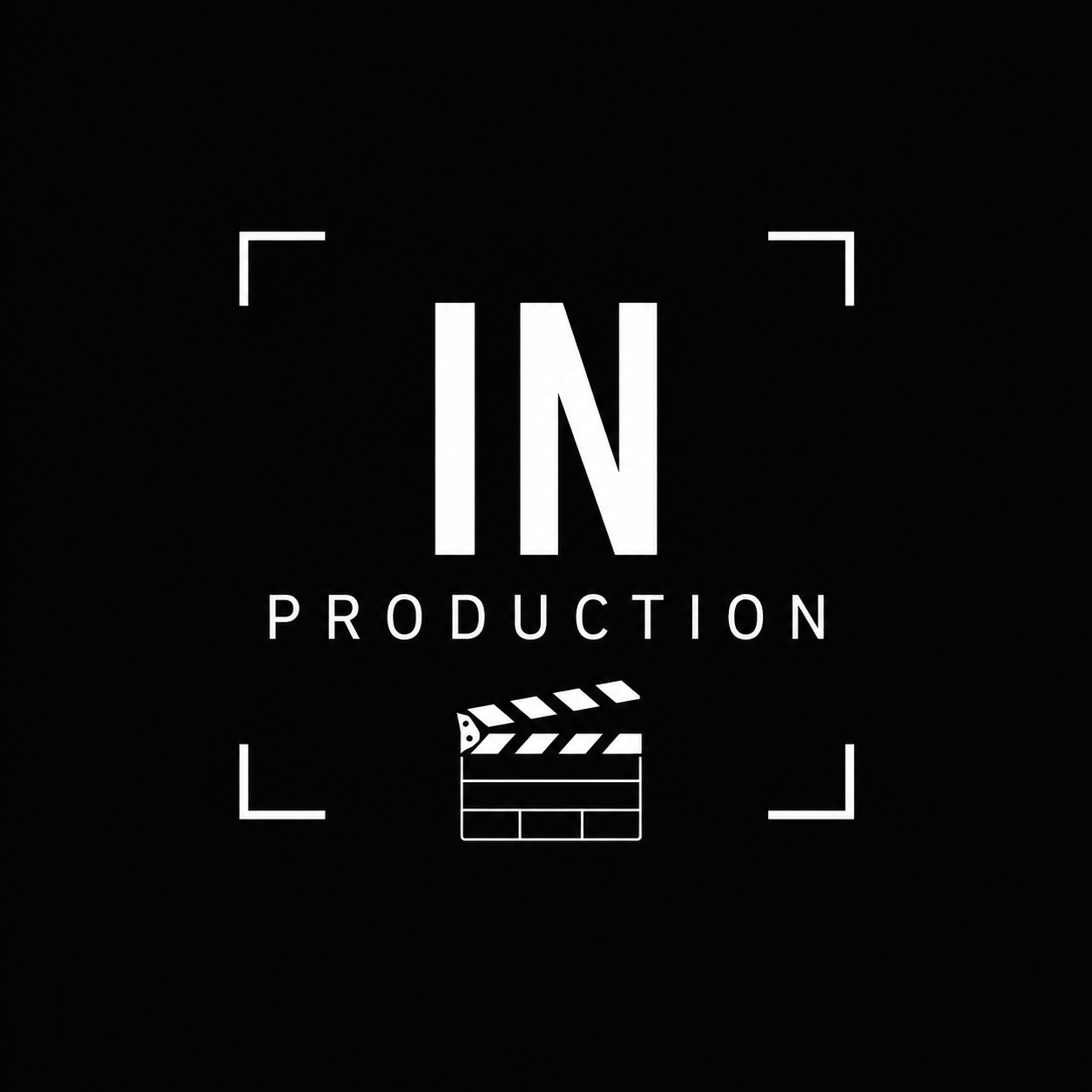 Black and white logo for IN Production, featuring film clapperboard icon at the bottom and corner brackets design.