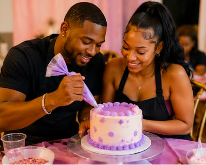 A man and woman celebrating with a birthday cake at a party.