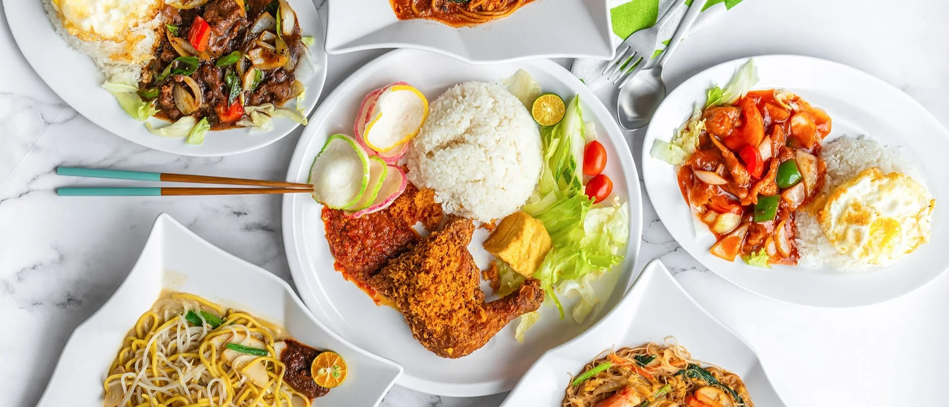 Singaporean & Malaysian Food by over a dozen providers, all under one roof.  Freshly-cooked satay, Nasi Lemak, Hainanese chicken rice, Teh Tarik, Sarawak Laksa, Bak Chor Mee, and much more