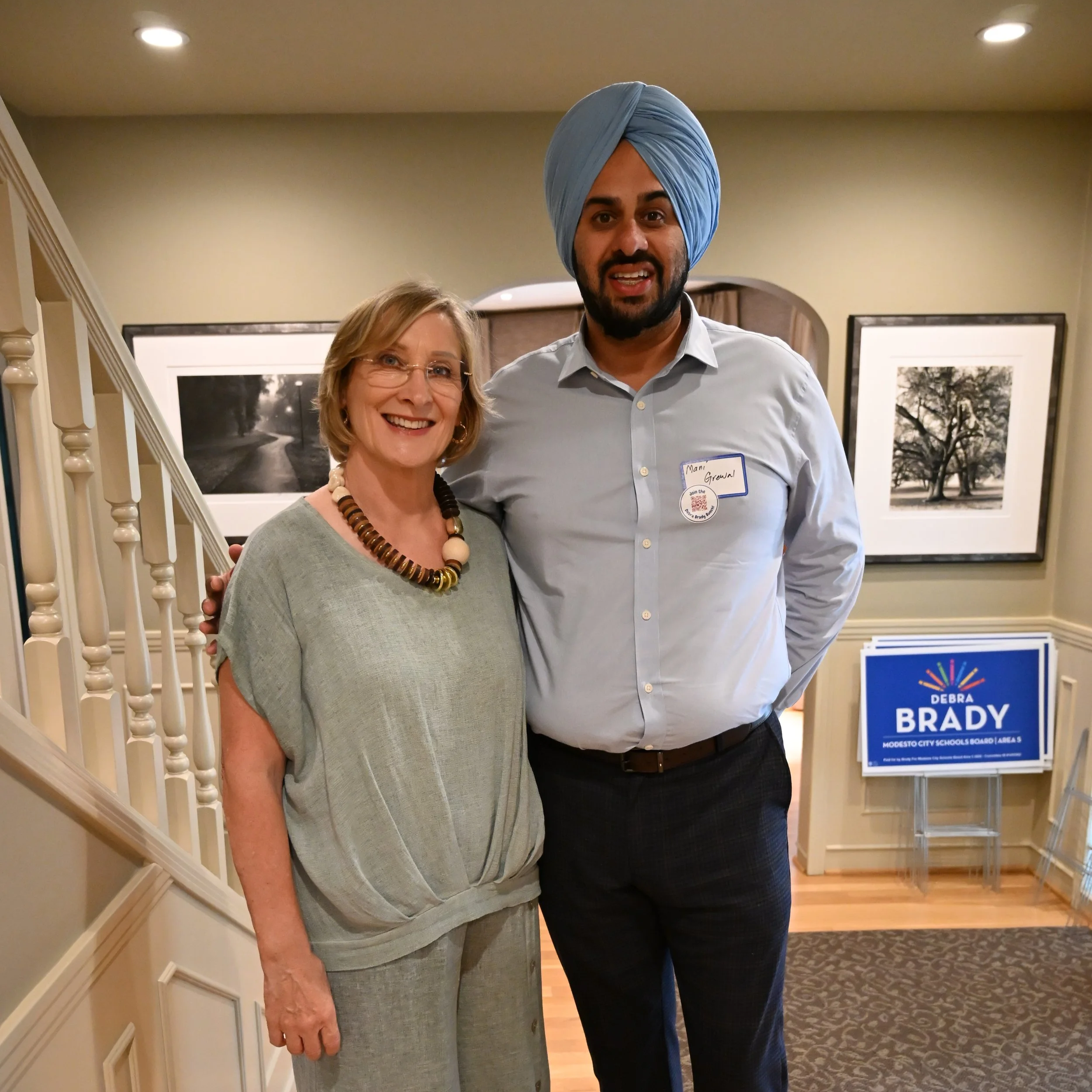 A photo of Supervisor of Stanislaus County District 4, Mani Grewal and Debra L. Brady.