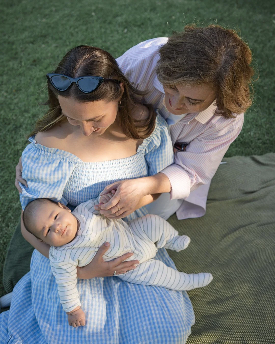 Outdoor family photography with three generations in a Melbourne park with newborn