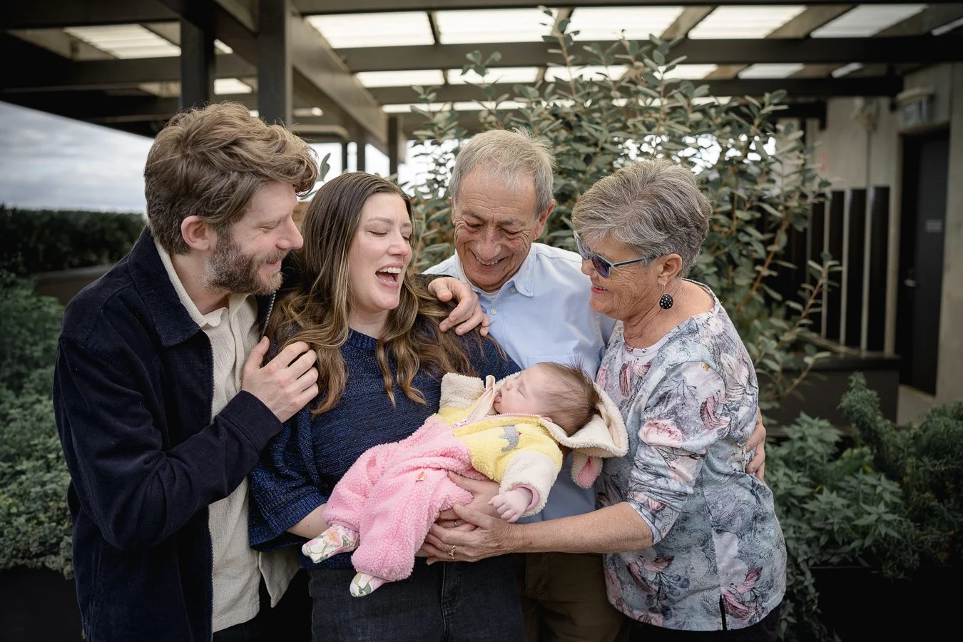 indoor Grandparents, parents and newborn together in Carlton.