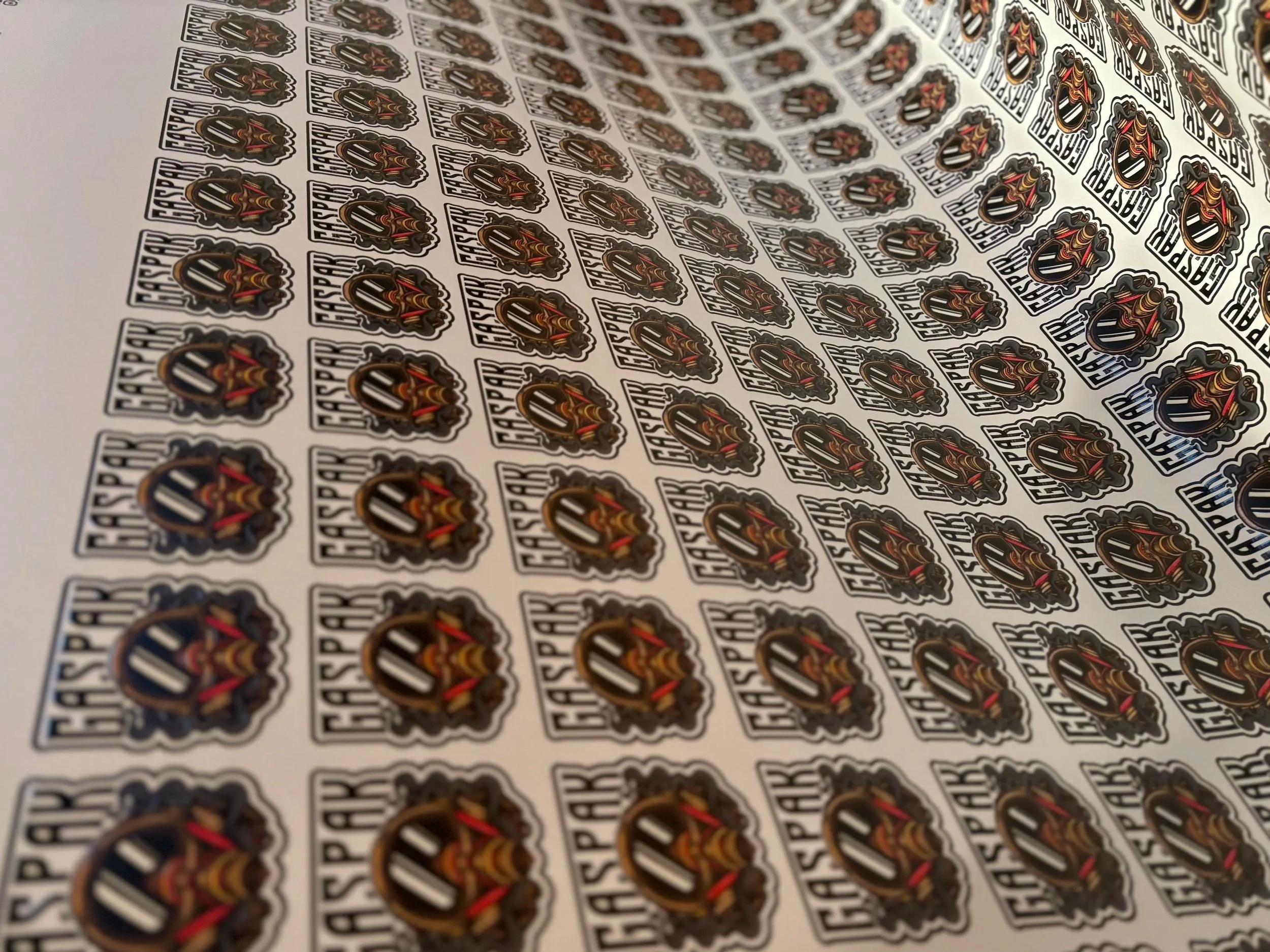 A sheet of stickers featuring a logo with a stylized letter 'A' and the word 'Faspar' in bold block letters.