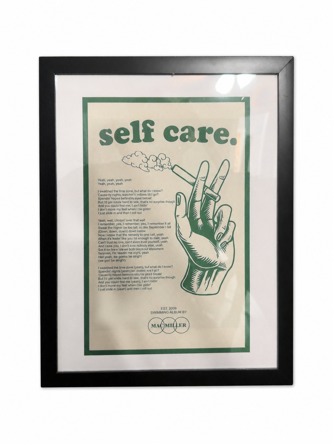 Framed poster with the words 'self care.' at the top, featuring an illustration of a hand holding a lit cigarette, with smoking clouds, and song lyrics related to self-care and personal reflection.
