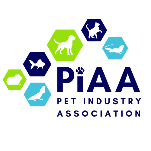 Logo of the Pet Industry Association featuring five colored hexagons with images of a rabbit, fish, dog, cat, and bird, along with the text 'PIAA Pet Industry Association'.