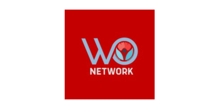 Logo of the WO Network with the letters WO and a circular emblem featuring a heart and stylized plant or seed design, on a red and black background.