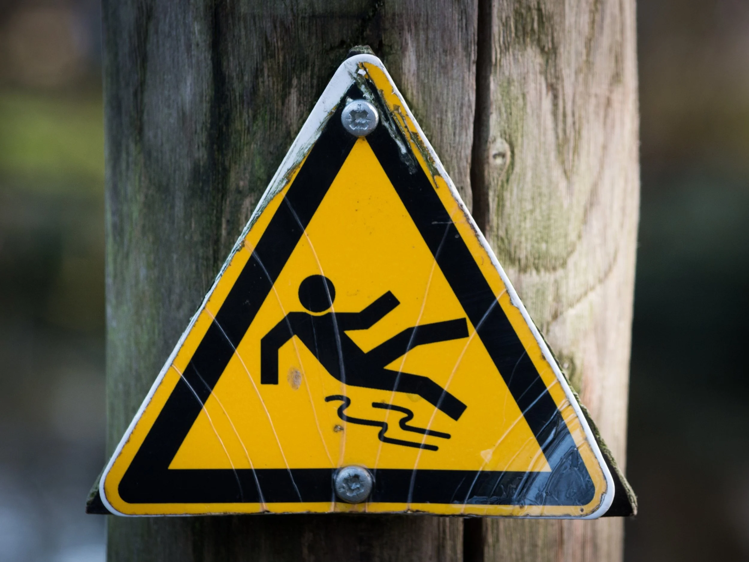 Yellow Caution Sign Warning of Falls