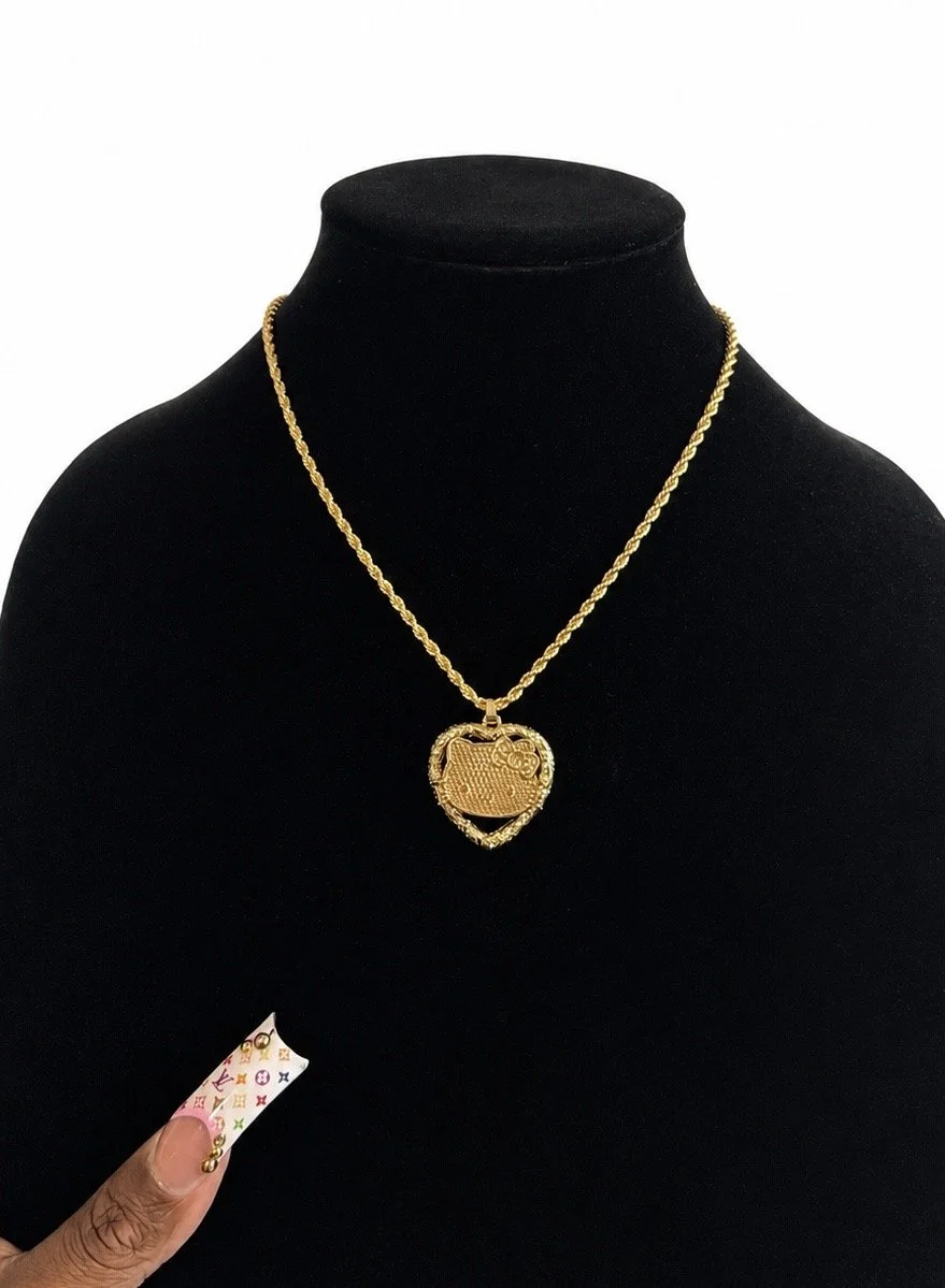 HK HEART FACE NECKLACE