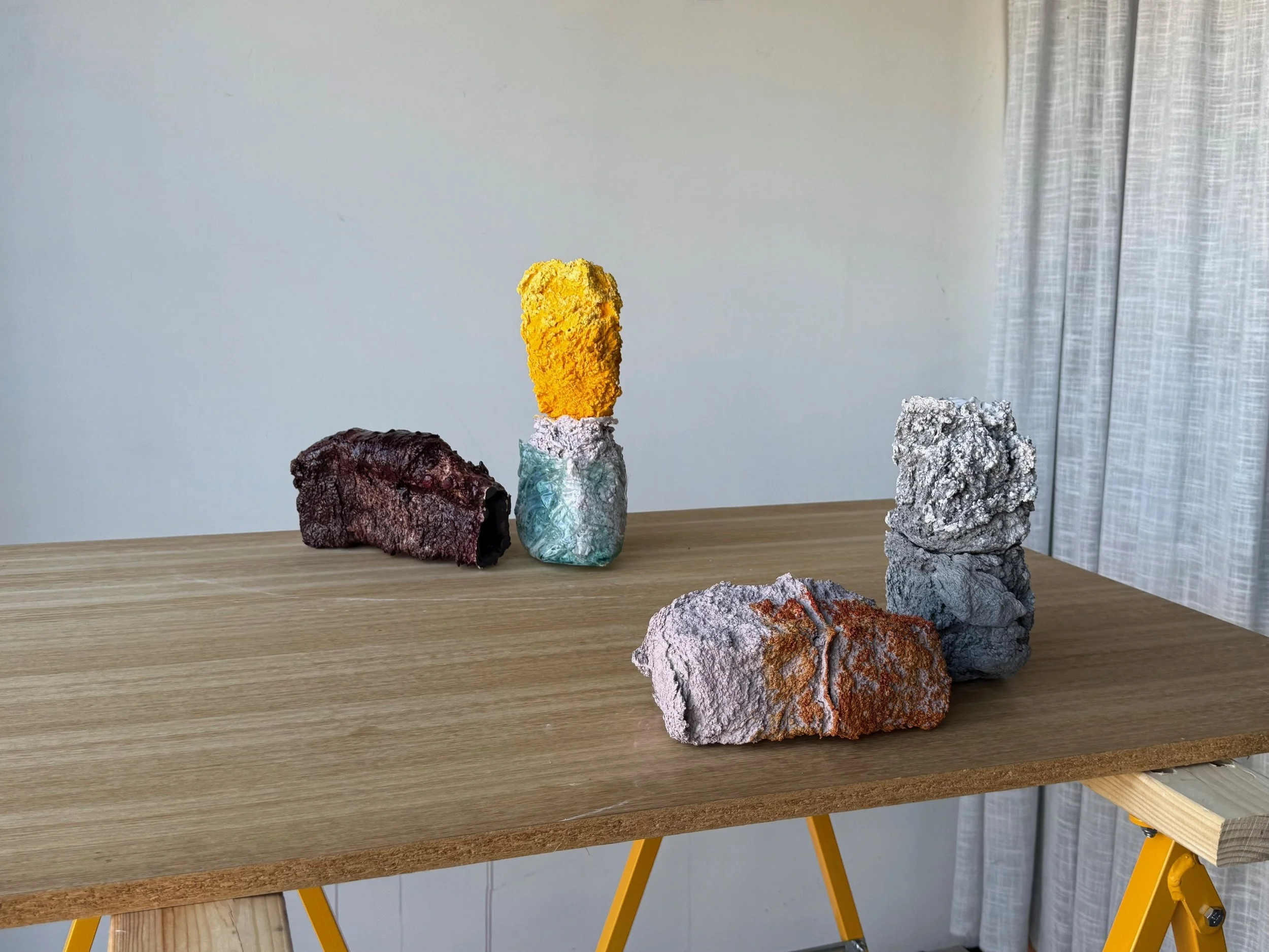 Beliefs.
2025.
Objects.  Bisque fired Porcelain, resin, acrylic, stain.