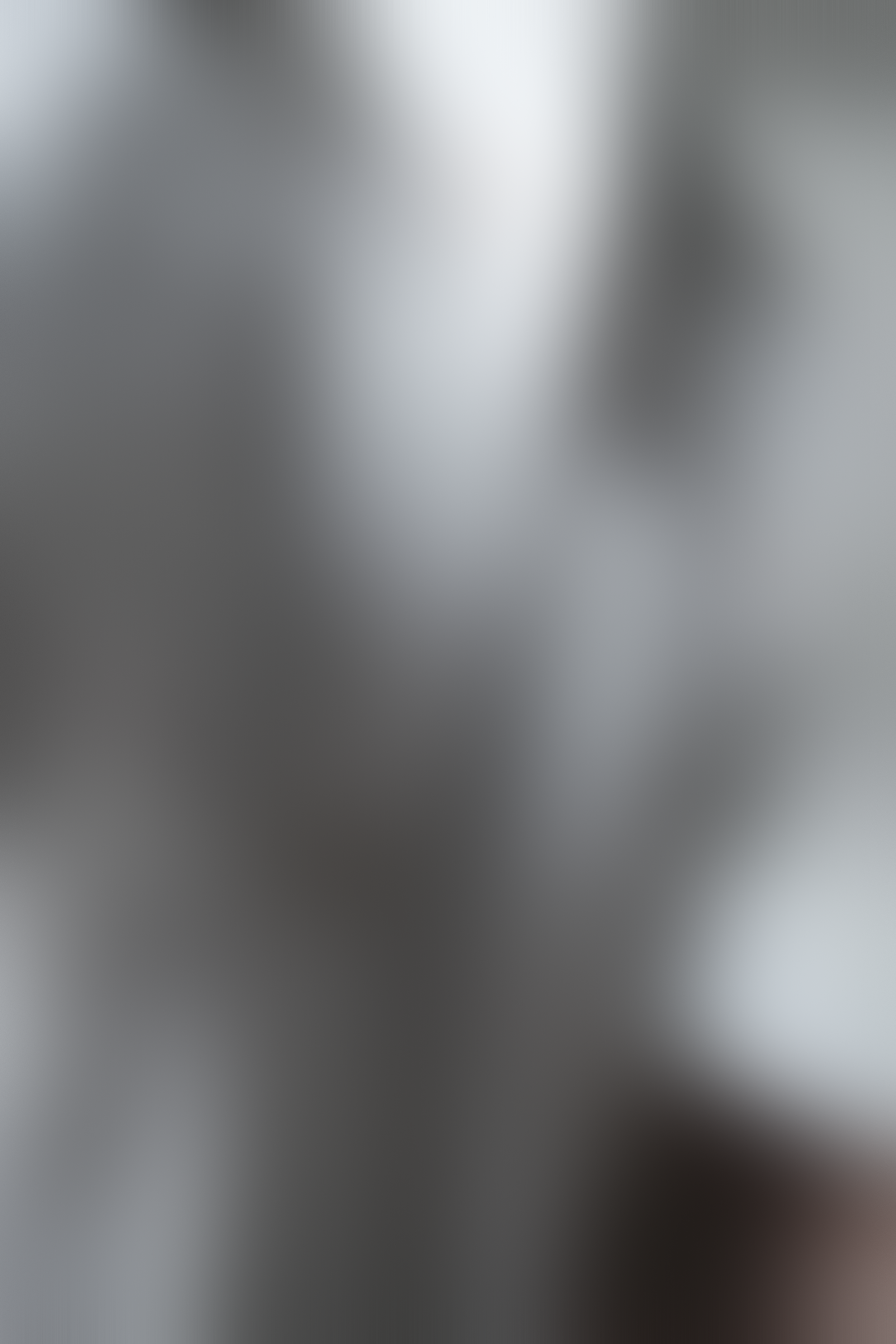 A blurred image with no distinguishable objects or details.