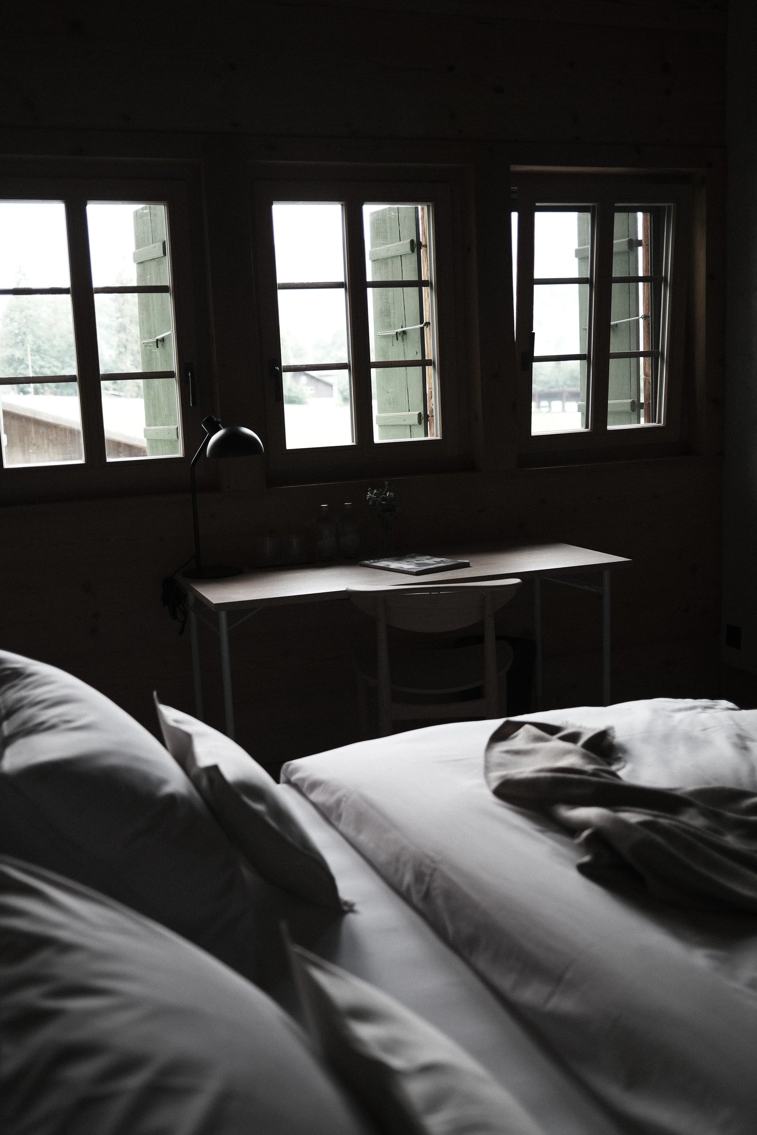 The Garden Room at Haus Mannenberg with a king-size bed, walk-in wardrobe and views across the garden.