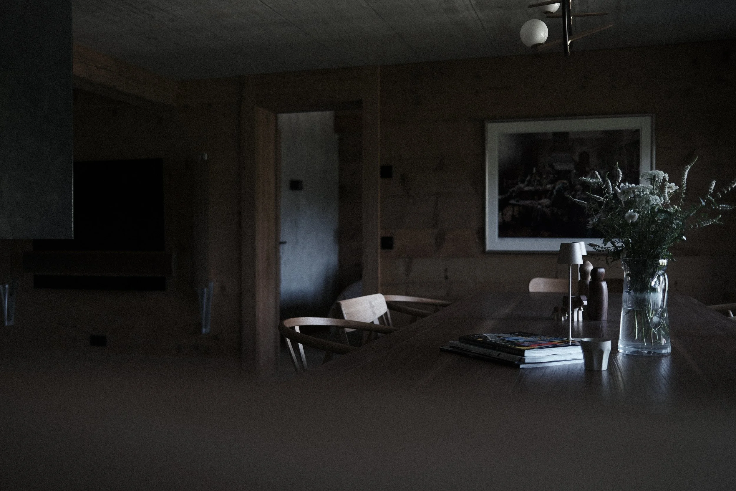 The communal breakfast table at Haus Mannenberg, where seasonal breakfasts are served each morning in the Bernese Oberland near Gstaad.