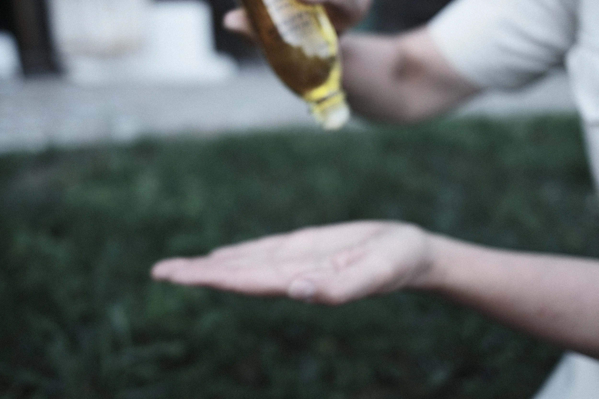 Applying Susanne Kaufmann body oil during a personalised wellbeing experience at Haus Mannenberg in the Bernese Oberland.