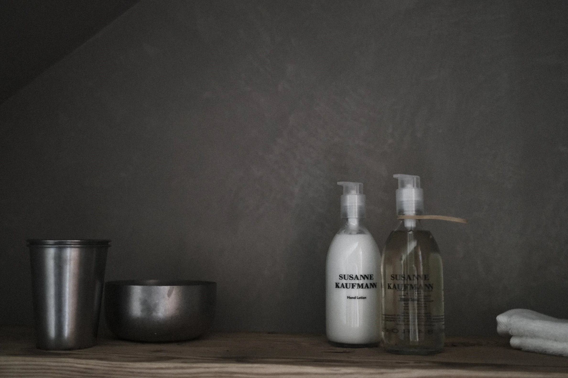 Susanne Kaufmann bathroom amenities provided in every guest room at Haus Mannenberg, featuring premium alpine skincare products.