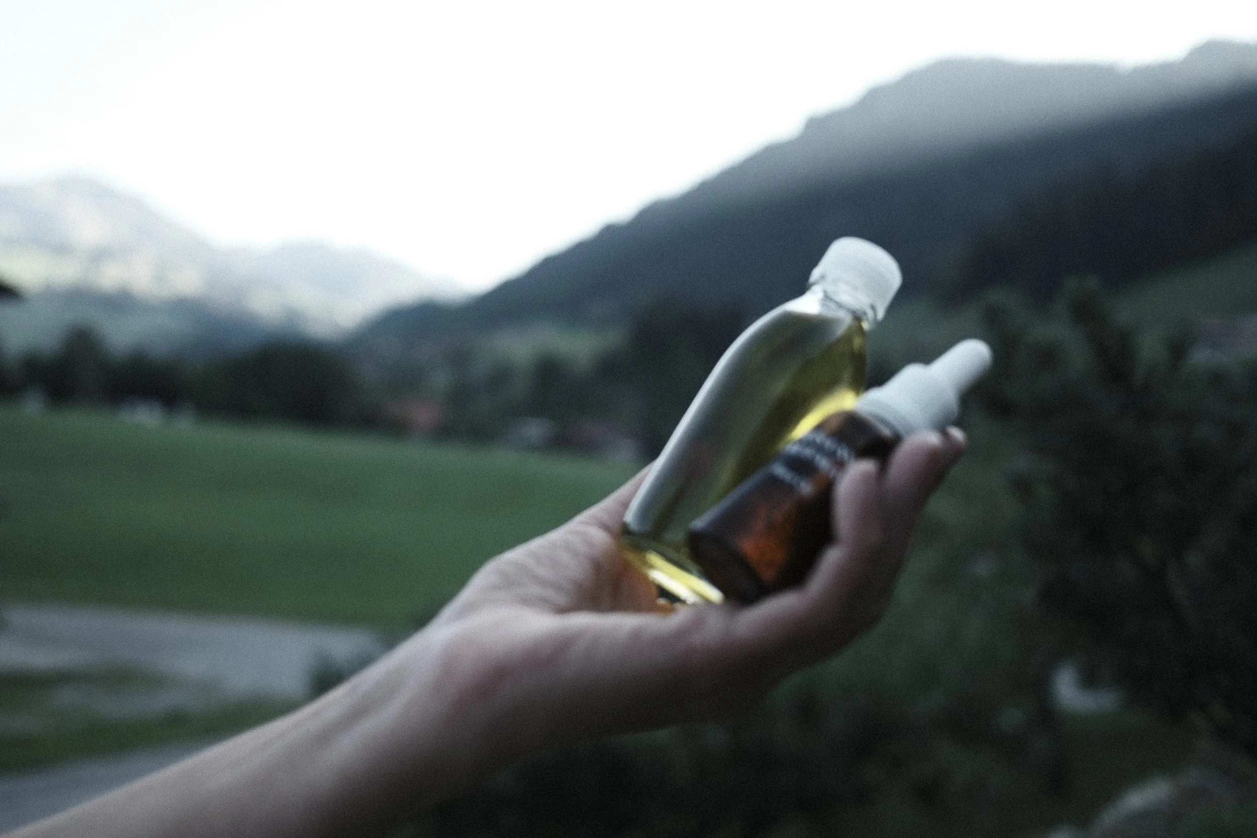 Susanne Kaufmann body oil and skincare at Haus Mannenberg with mountain views, part of a slow wellbeing experience in the Bernese Oberland near Gstaad.