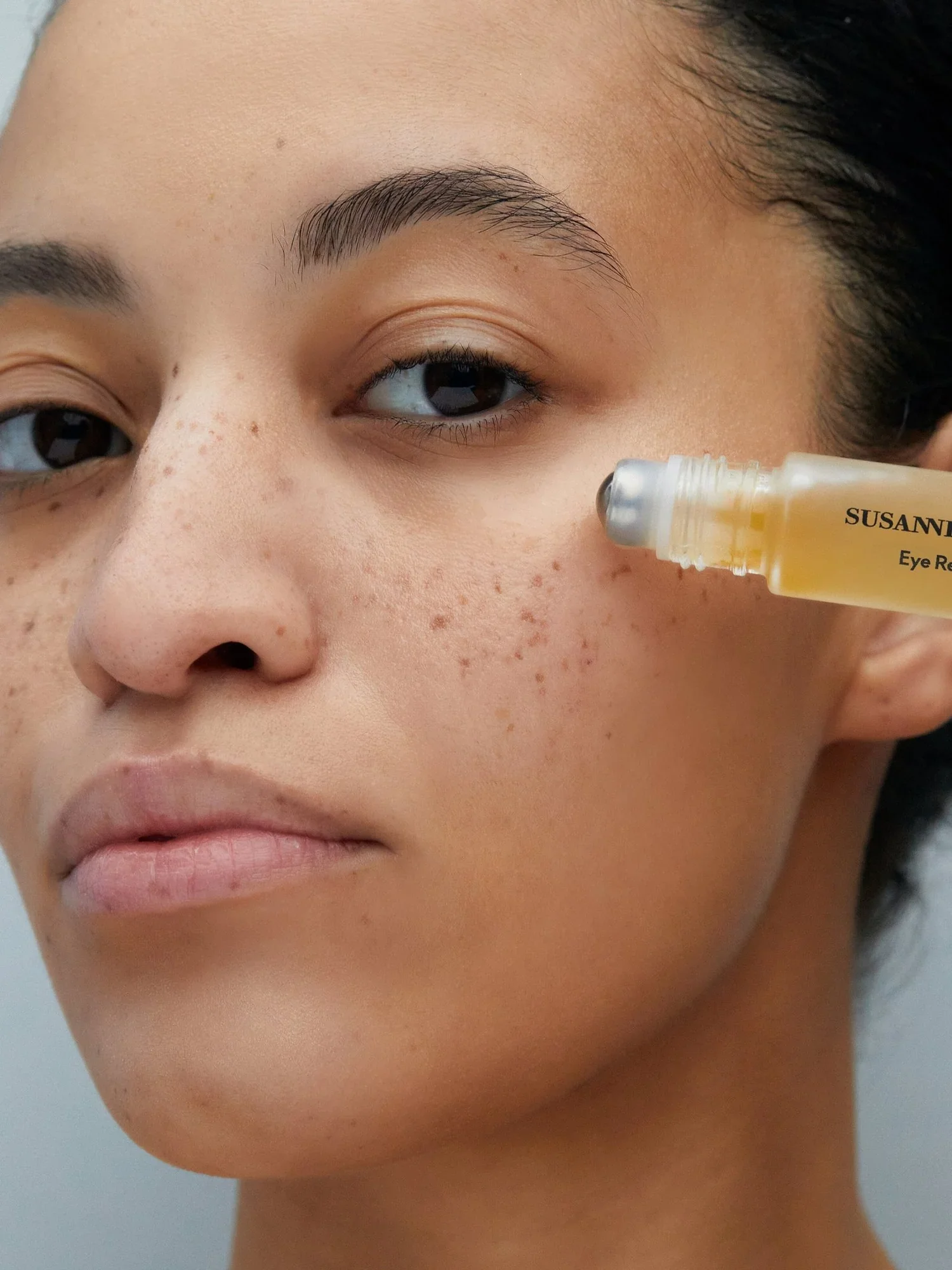 02EyeRescueSerum-Model.jpg.webp