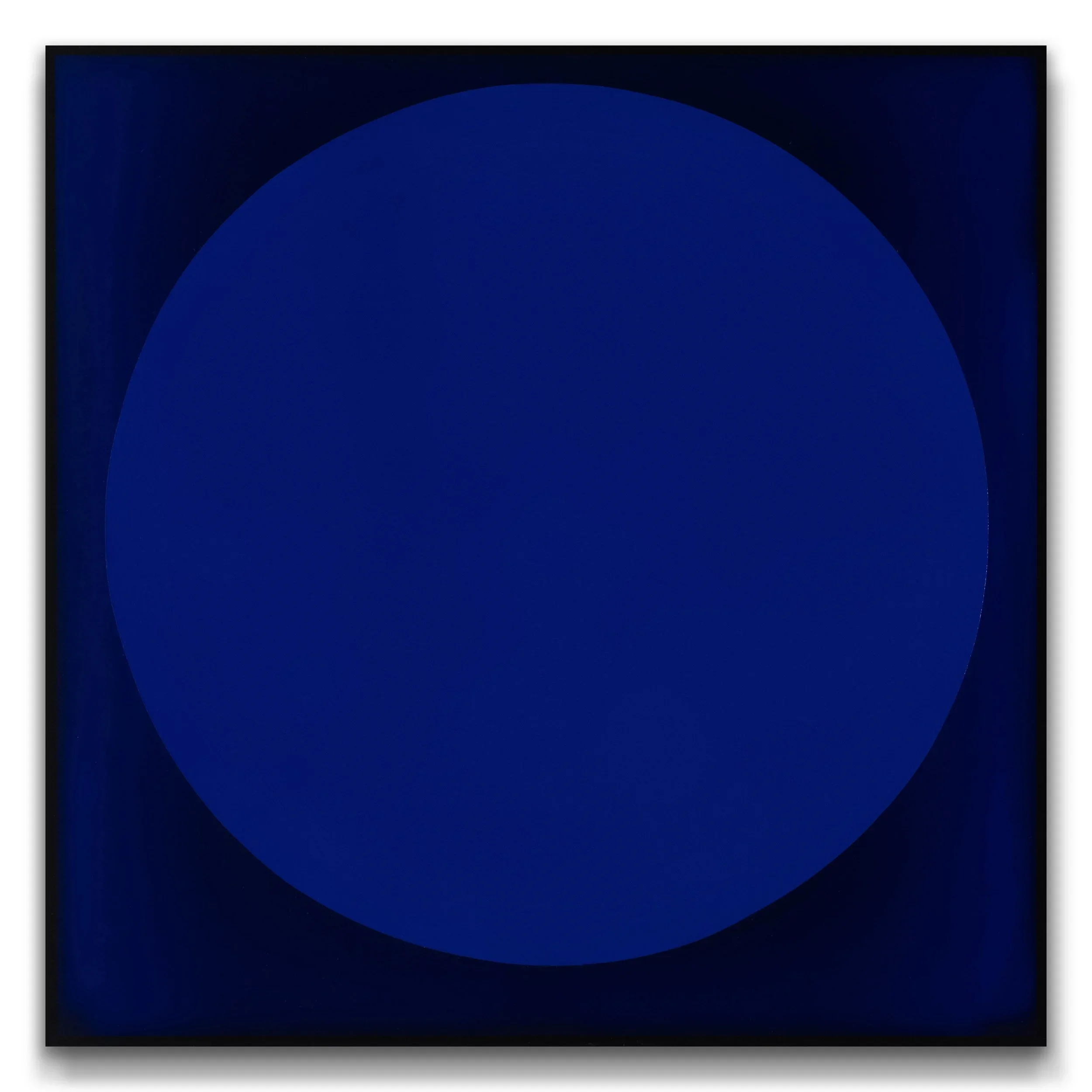 Contemporary minimalist artwork featuring a large ultramarine blue circle on a deep blue background