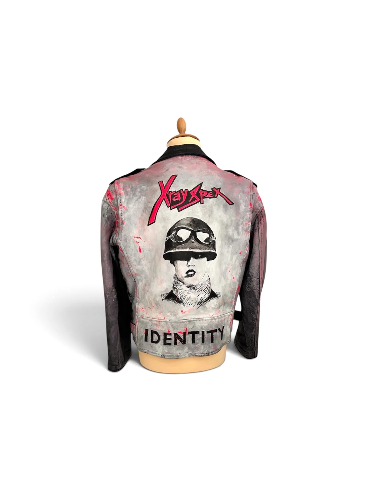 Vintage leather jackets by artist UK Exquisite Hooligan - Exquisite Hooligan artist studio. Working with reclaimed vintage leather jackets - acrylic leather paint - the detritus and debris of everyday life - hand-applied studs - classic vintage butto