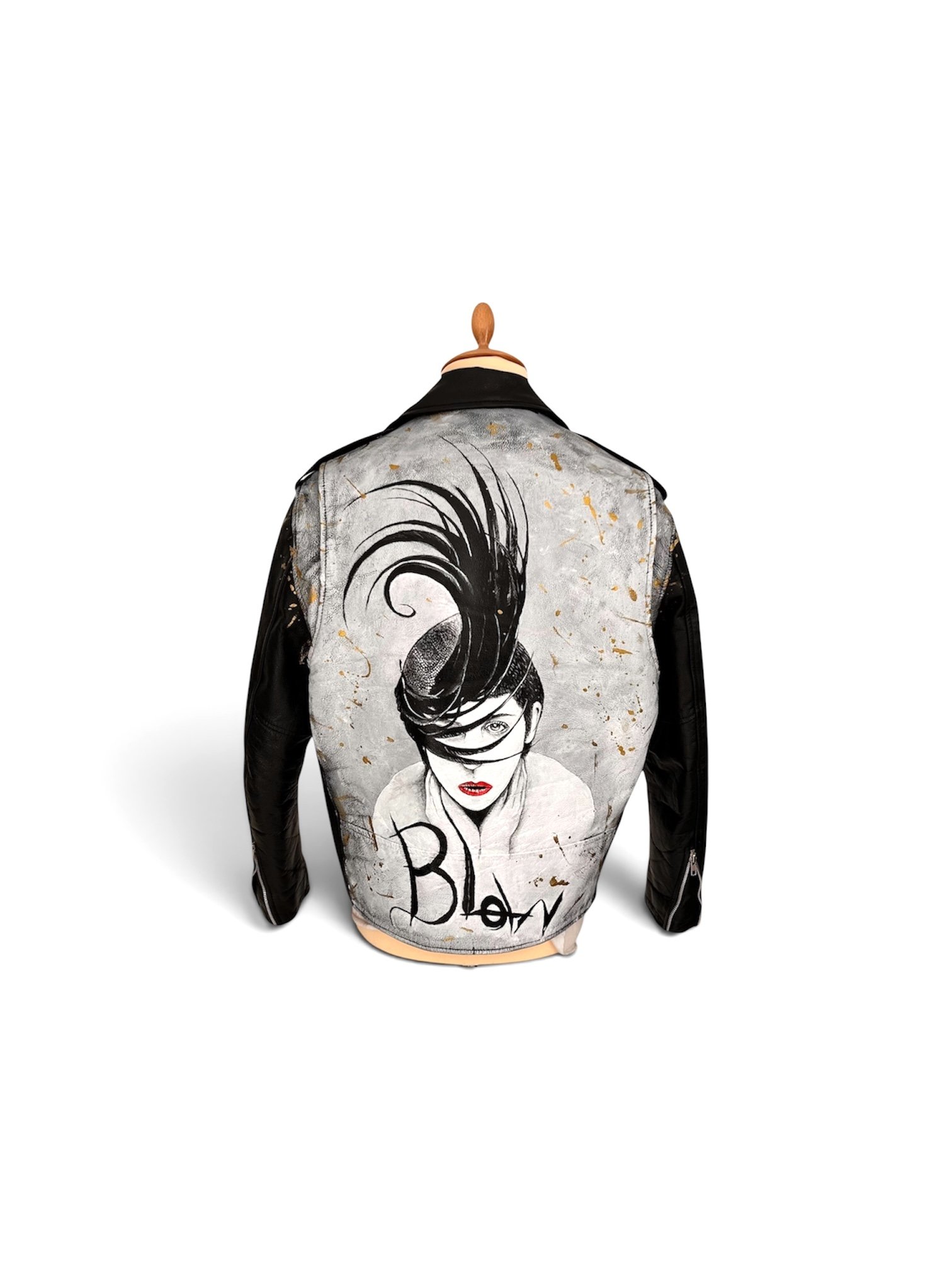 Vintage leather jackets by artist UK Exquisite Hooligan - Exquisite Hooligan artist studio. Working with reclaimed vintage leather jackets - acrylic leather paint - the detritus and debris of everyday life - hand-applied studs - classic vintage butto