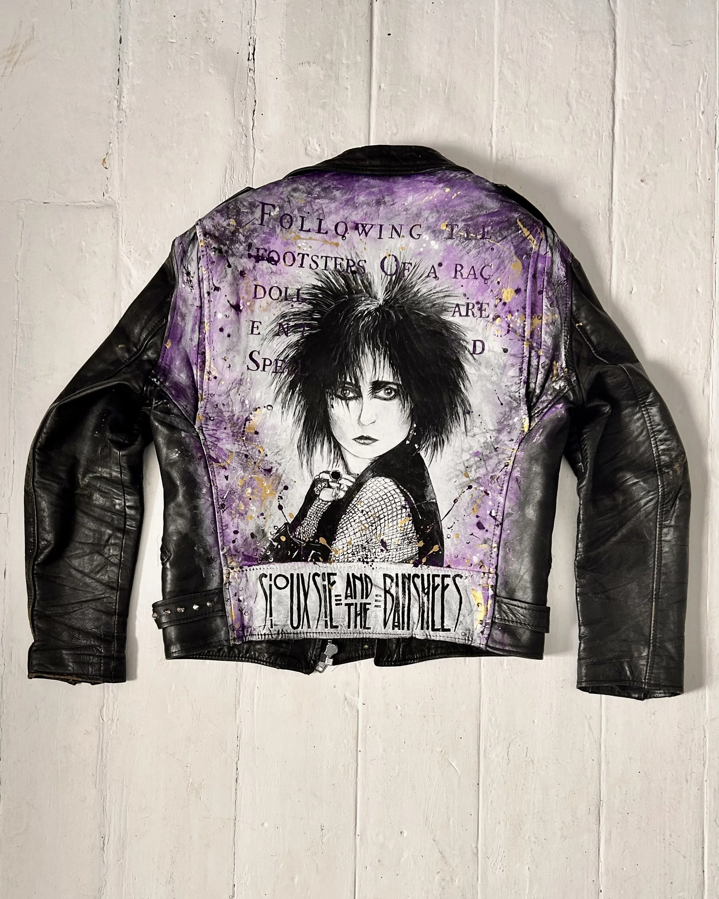 What time tunnel did you come through? Siouxsie Sioux - Siouxsie and the Banshees. Formed from a reclaimed vintage leather jacket - acrylic leather paint - the detritus and debris of everyday life - hand-applied studs - classic vintage button badges 