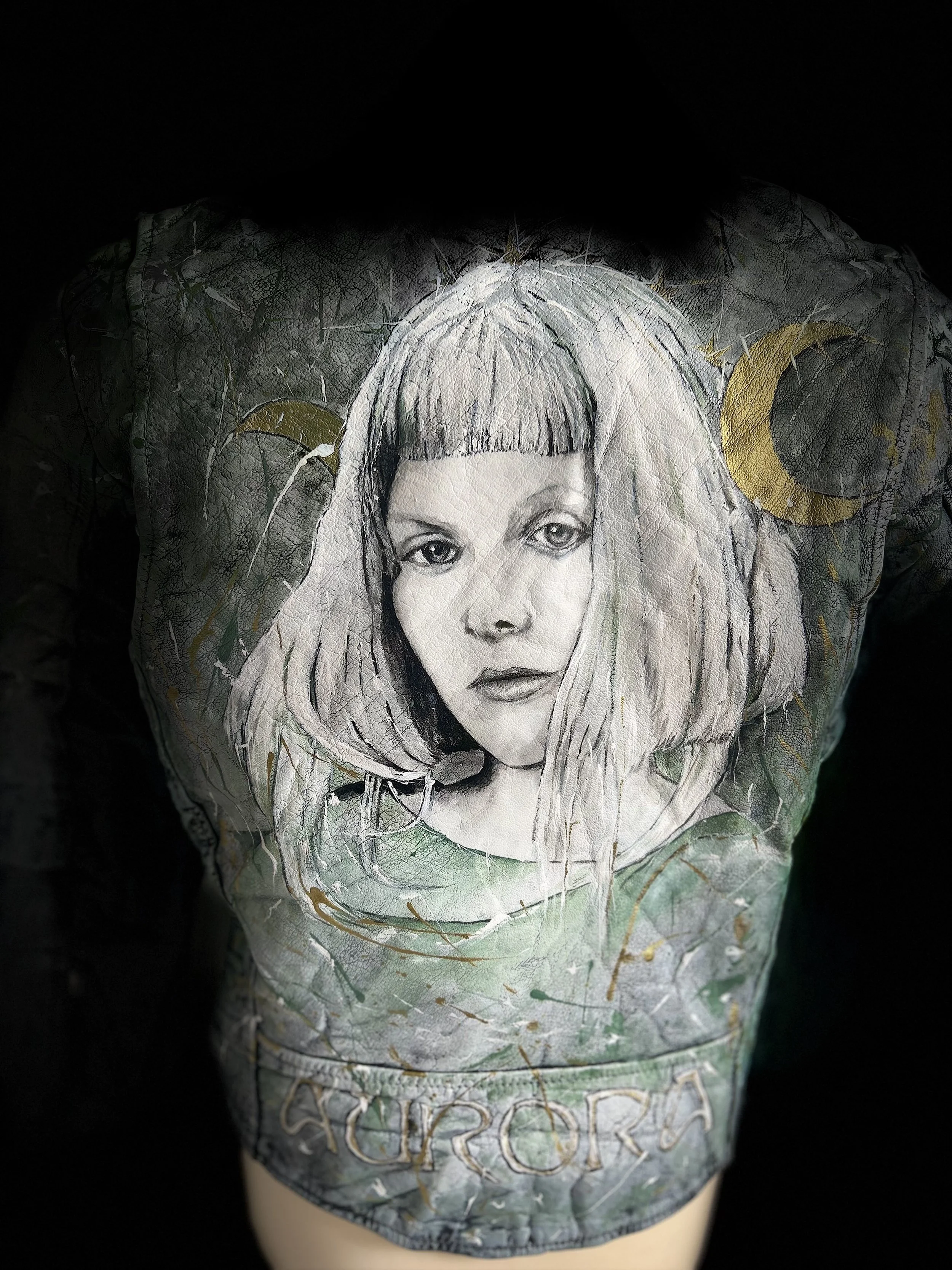 Nature has been my secret lover for a long time. Aurora Aksnes

Subject - Aurora Aksnes - Arrived in this world 15th June 1996 – Stavanger, Norway

Vintage leather jacket - Acrylic leather paint, studs, detritus of life, vintage butterfly brooch.

Da