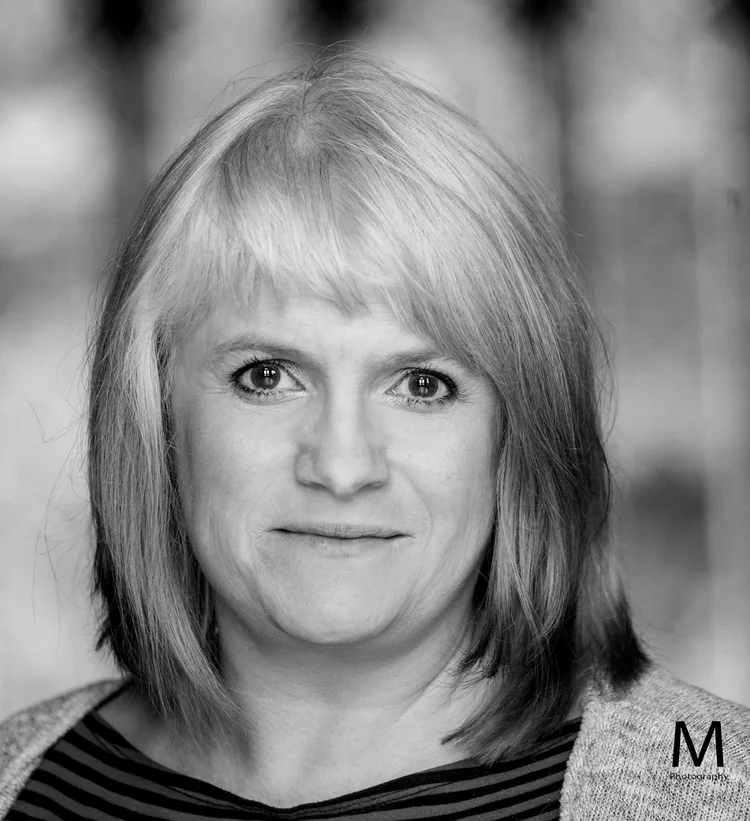 Black-and-white headshot of actor and puppeteer Myette Godwyn.