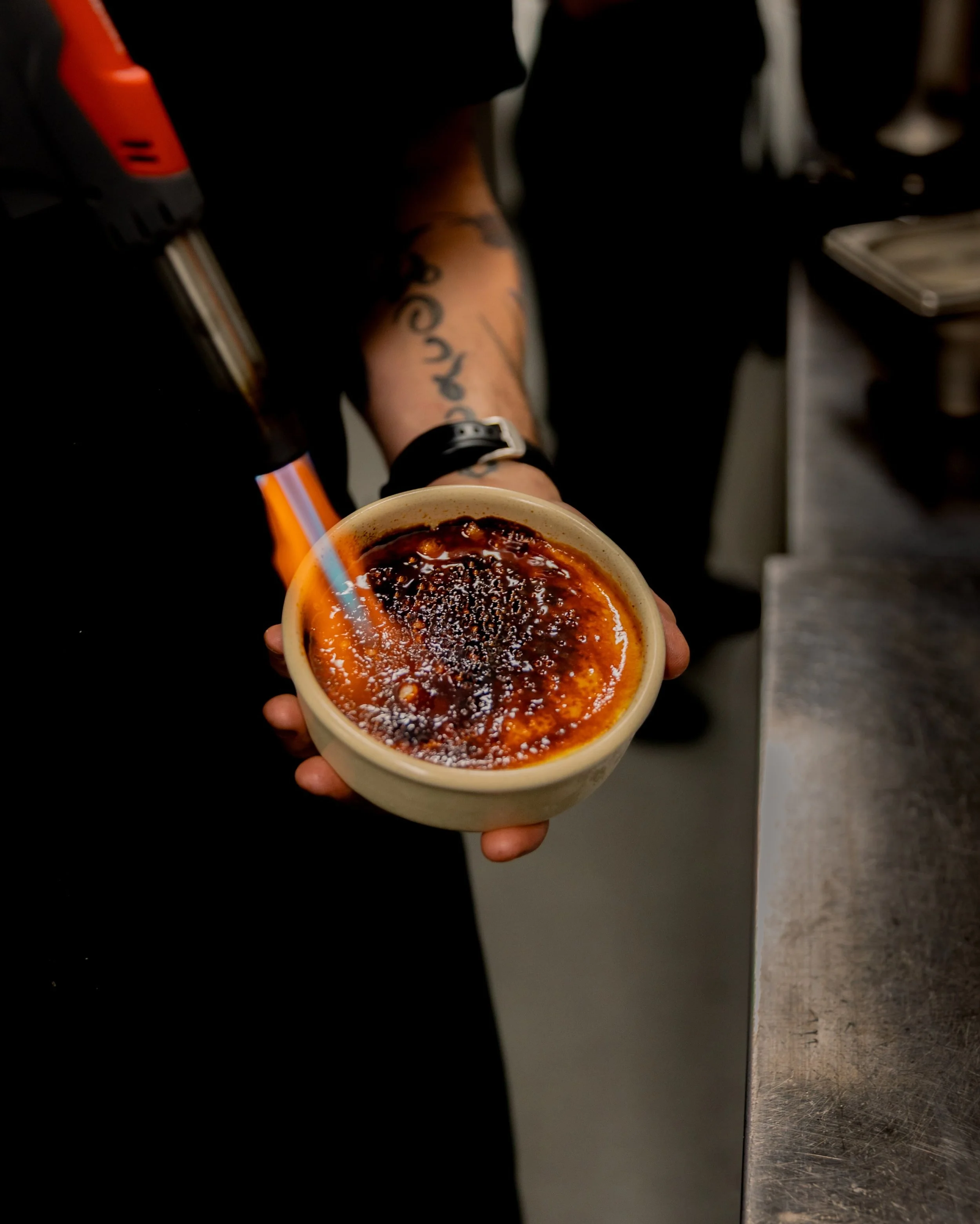 Save room.
Cr&egrave;me br&ucirc;l&eacute;e, dulce de leche.

Classic. Unapologetic. Worth every last spoon.