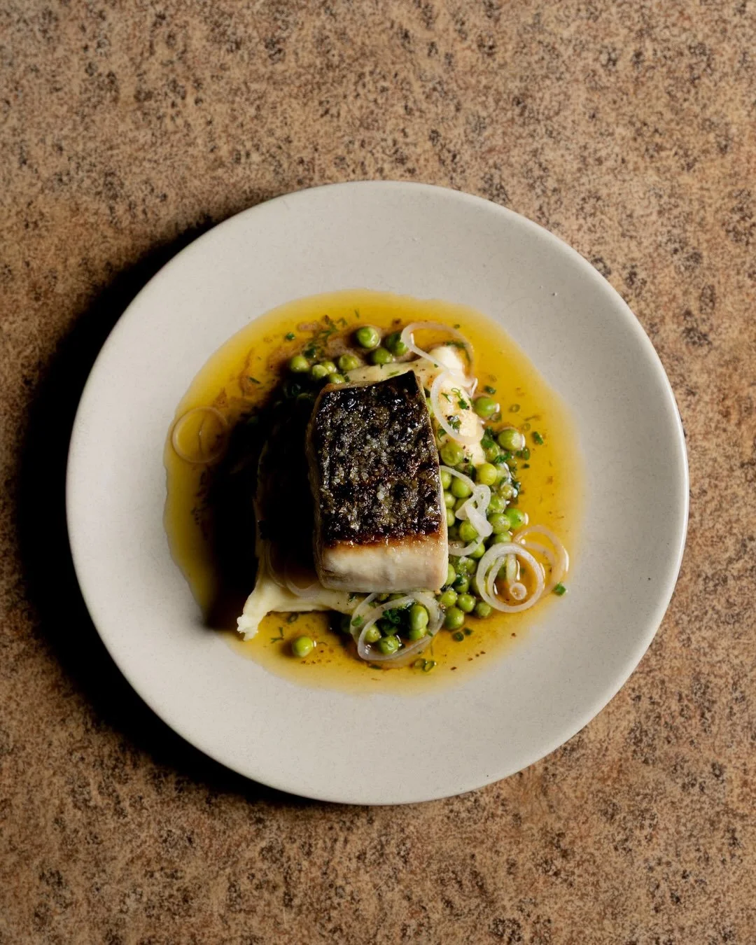 Fish of the day. A Glenelg favourite, and for good reason.

Rich, buttery mash. Sharp pickled shallots to cut through. A dish that hits hard without trying too hard.

Sustainably line caught in local waters by our friends at @fleming_fish_co
