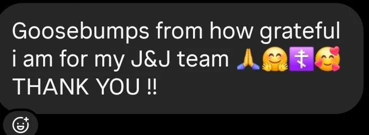 Text message expressing gratitude to J&J team, with praying, hugging, cross, and smiling face with hearts emojis.