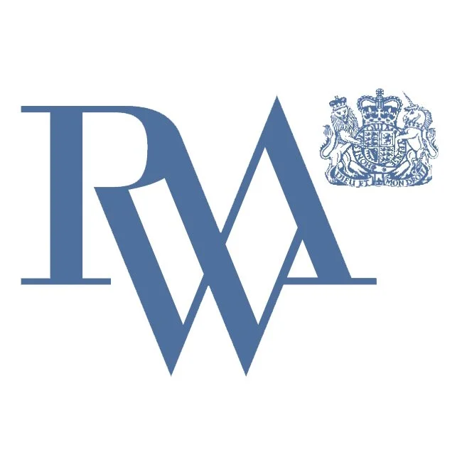 Logo with intertwined letter R, M, and A, and a crest with a crown in the upper right corner.