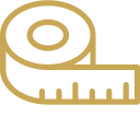 A gold-colored tape measure with a black blade showing measurement markings.