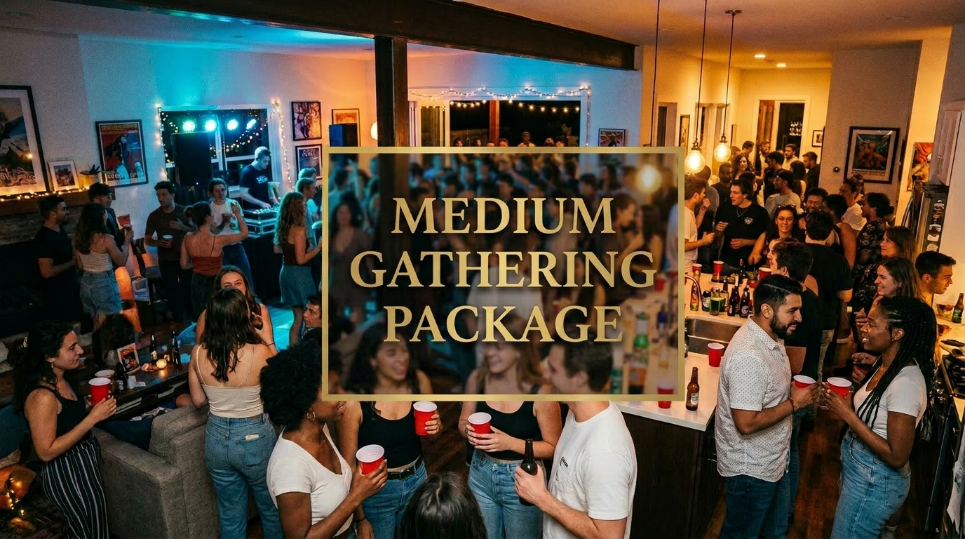 A crowded indoor party with people socializing and drinking, decorated with string lights and artwork on the walls.
